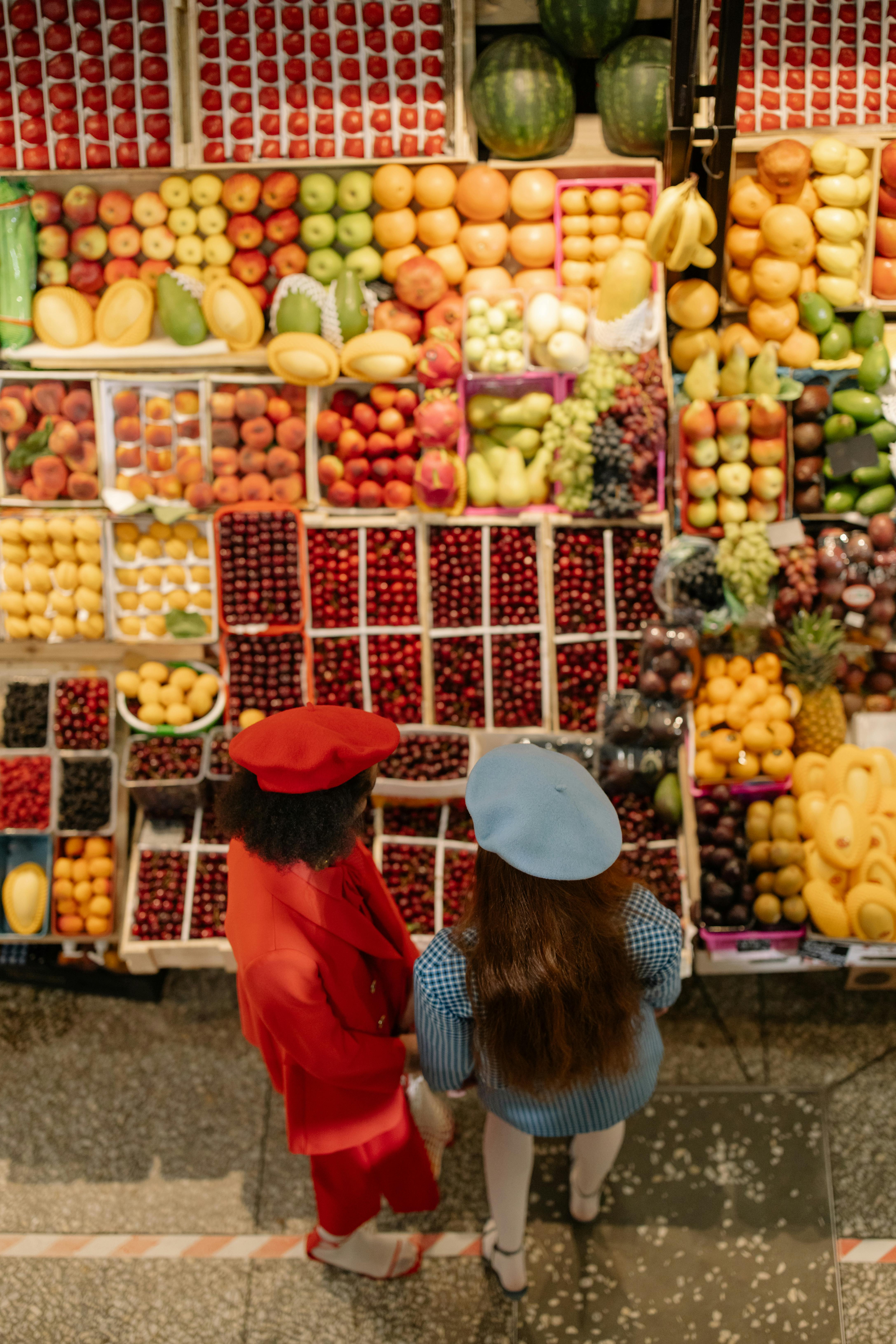 Two women at a grocery store | Source: Pexels