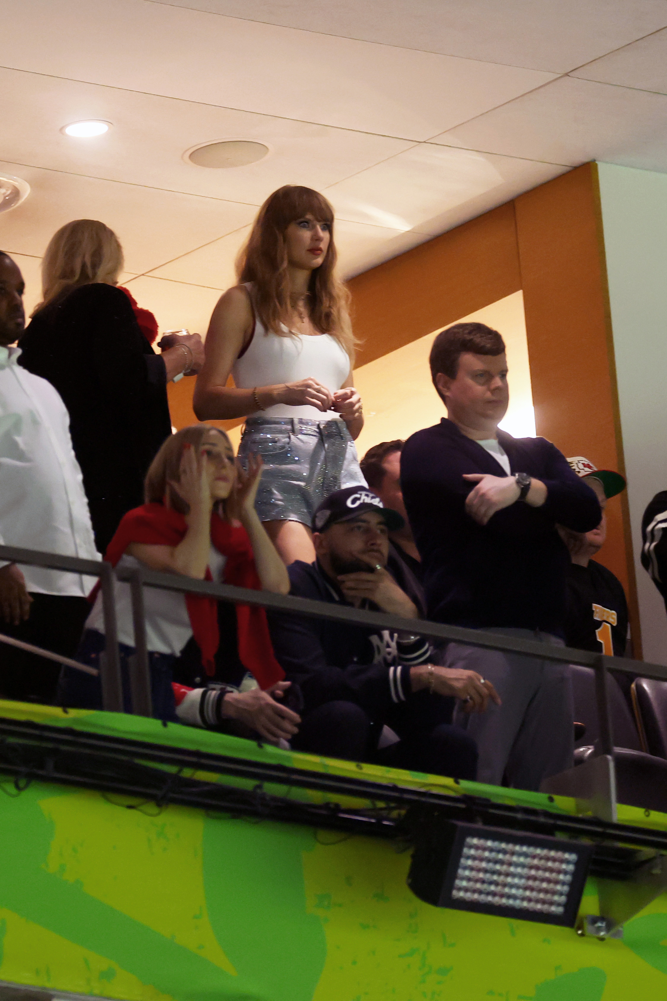 Ashley Avignone, Taylor Swift, and Ross Travis look anxious during Super Bowl LIX | Source: Getty Images