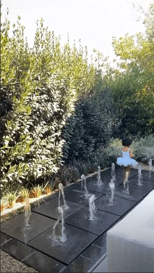 An image of Stormi walking around a fountain on her mom's Instagram story | Photo: Instagram/kyliejenner