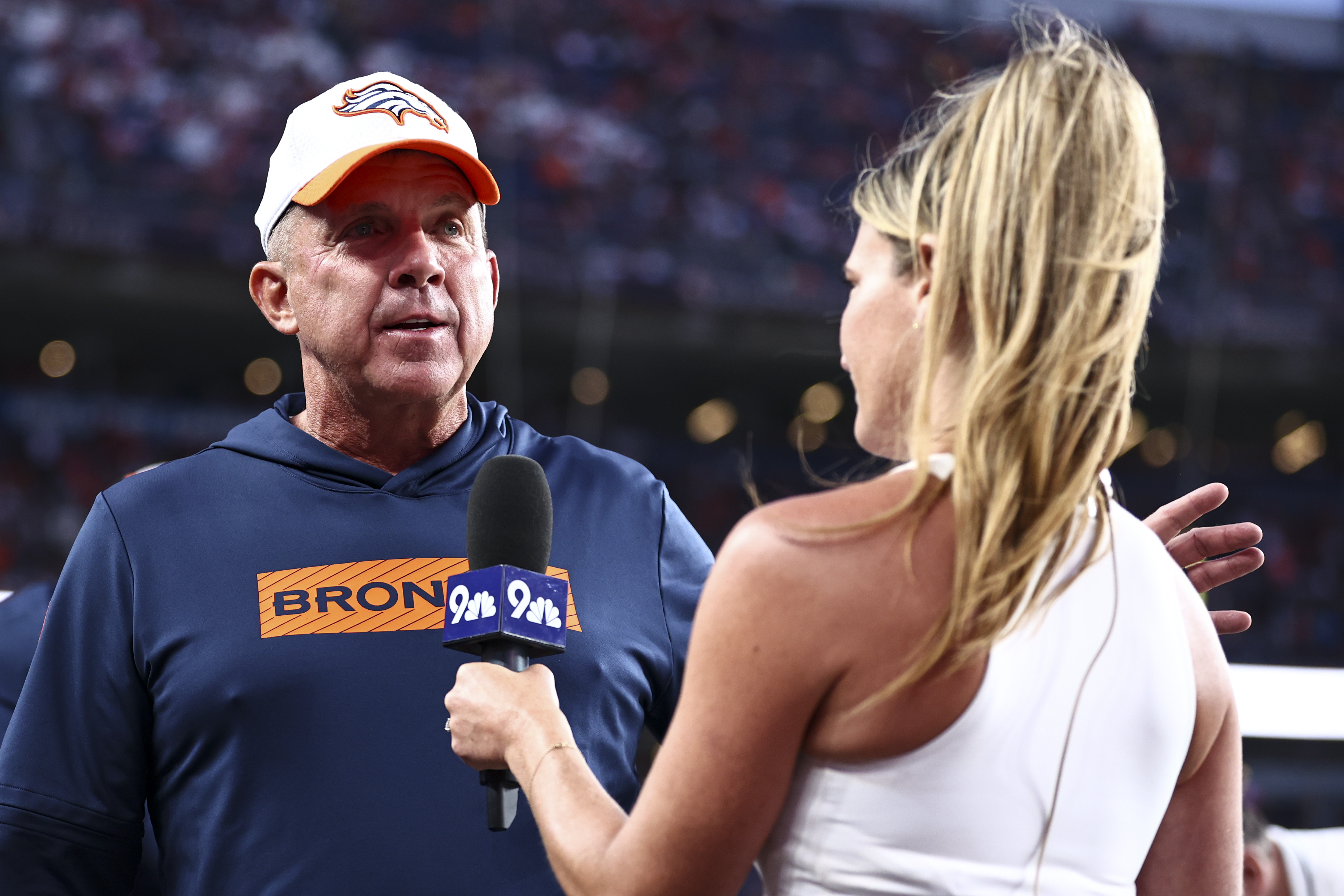 Denver Broncos coach Sean Payton being interviewed during the preseason game against the Green Bay Packers in Denver, Colorado on August 18, 2024 | Source: Getty Images