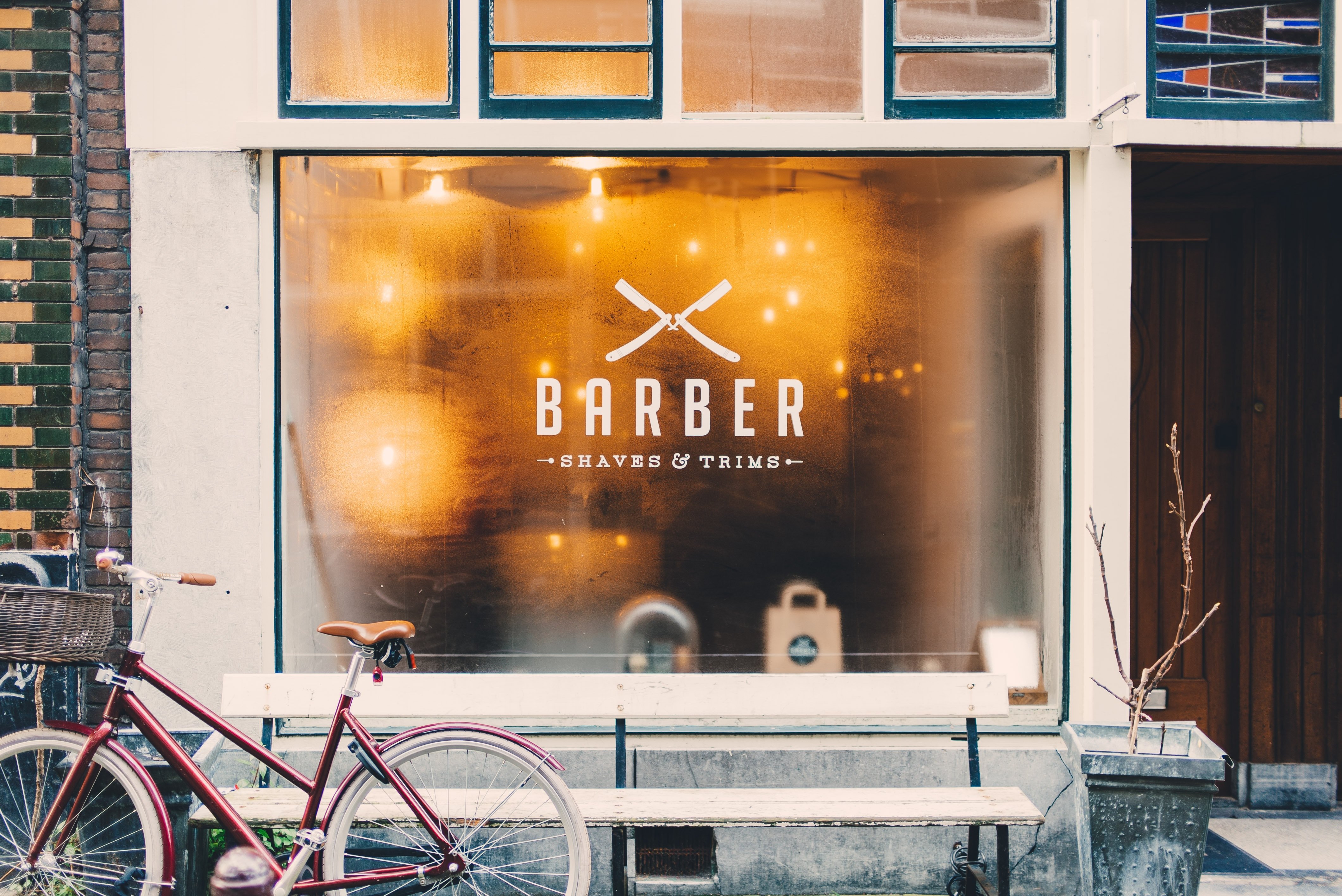 A barber's shop store front. | Photo: Unsplash