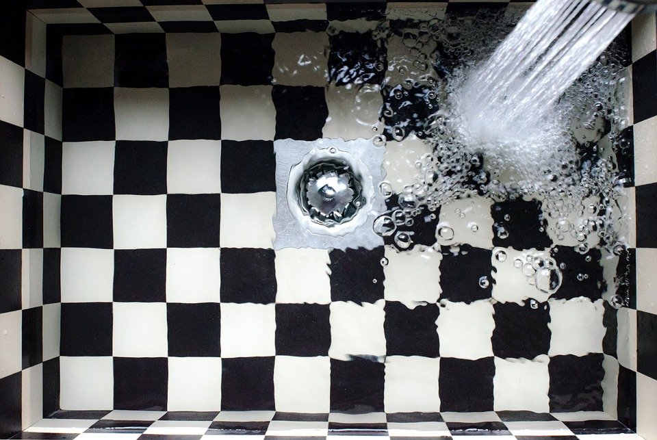 A photo of a shower drain. | Photo: Pixabay