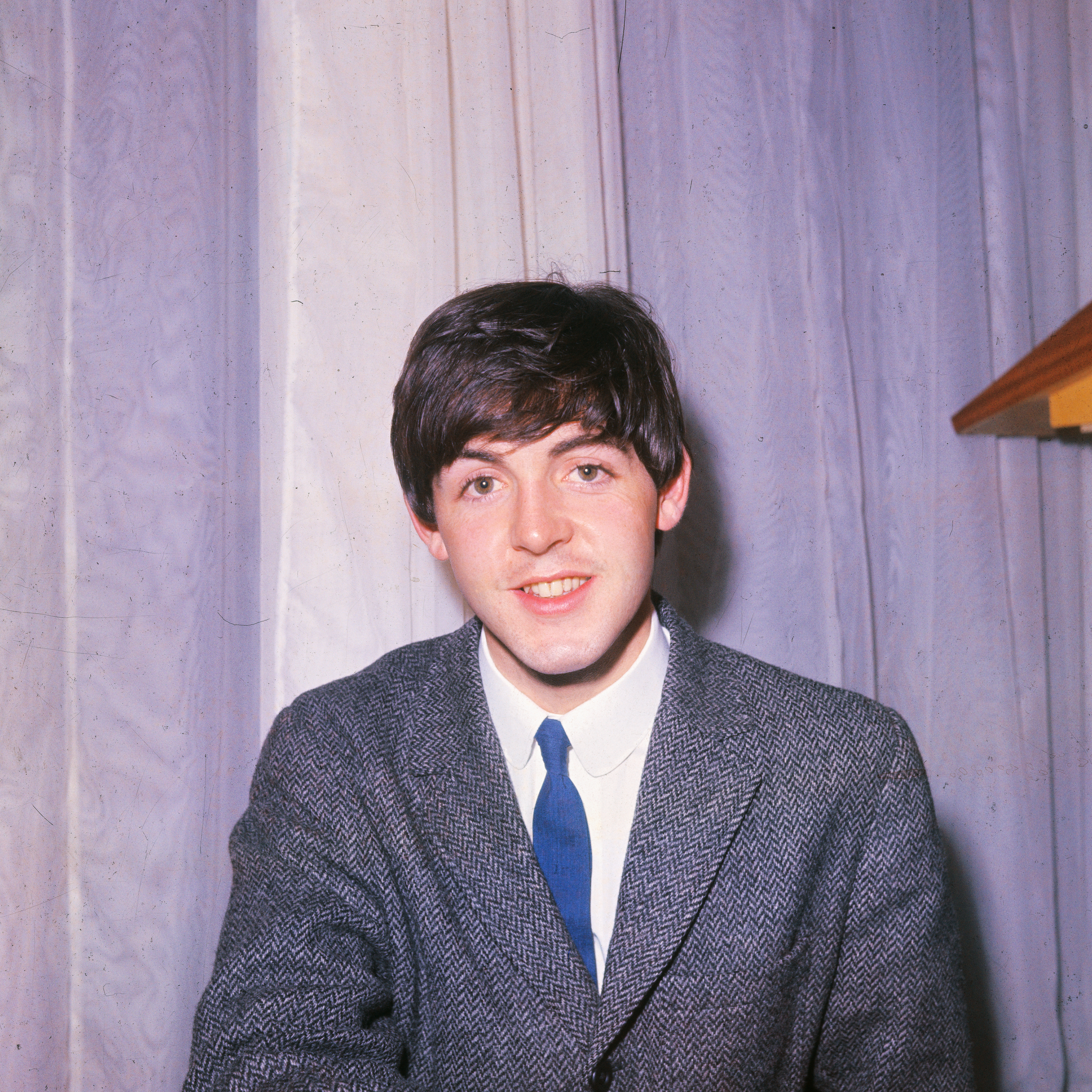Paul McCartney poses on December 18, 1964 in London, England | Source: Getty Images