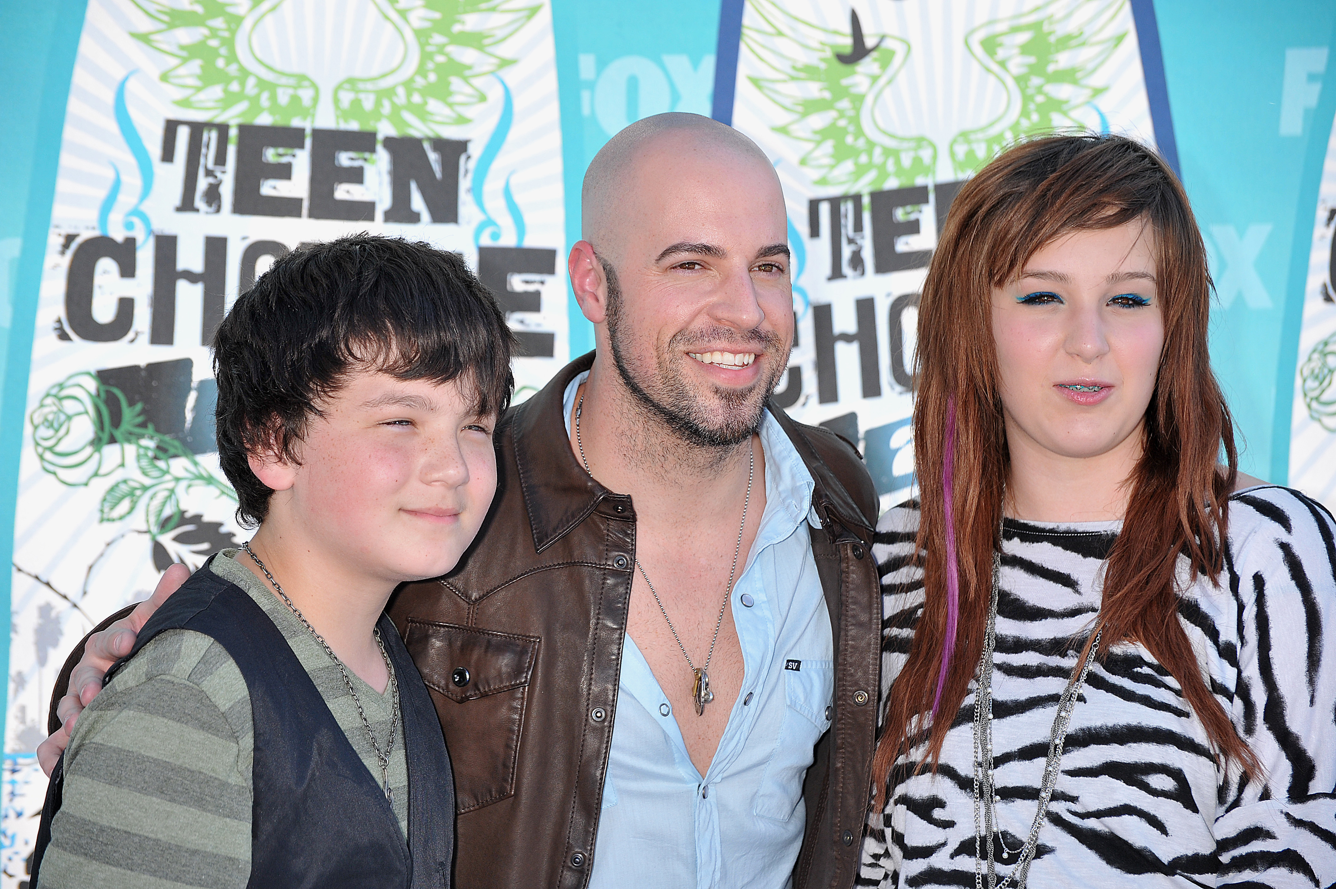 Chris Daughtry and his stepchildren Griffin and Hannah Price arrive at the 2010 Teen Choice Awards on August 8, 2010, in Universal City. | Source: Getty Images