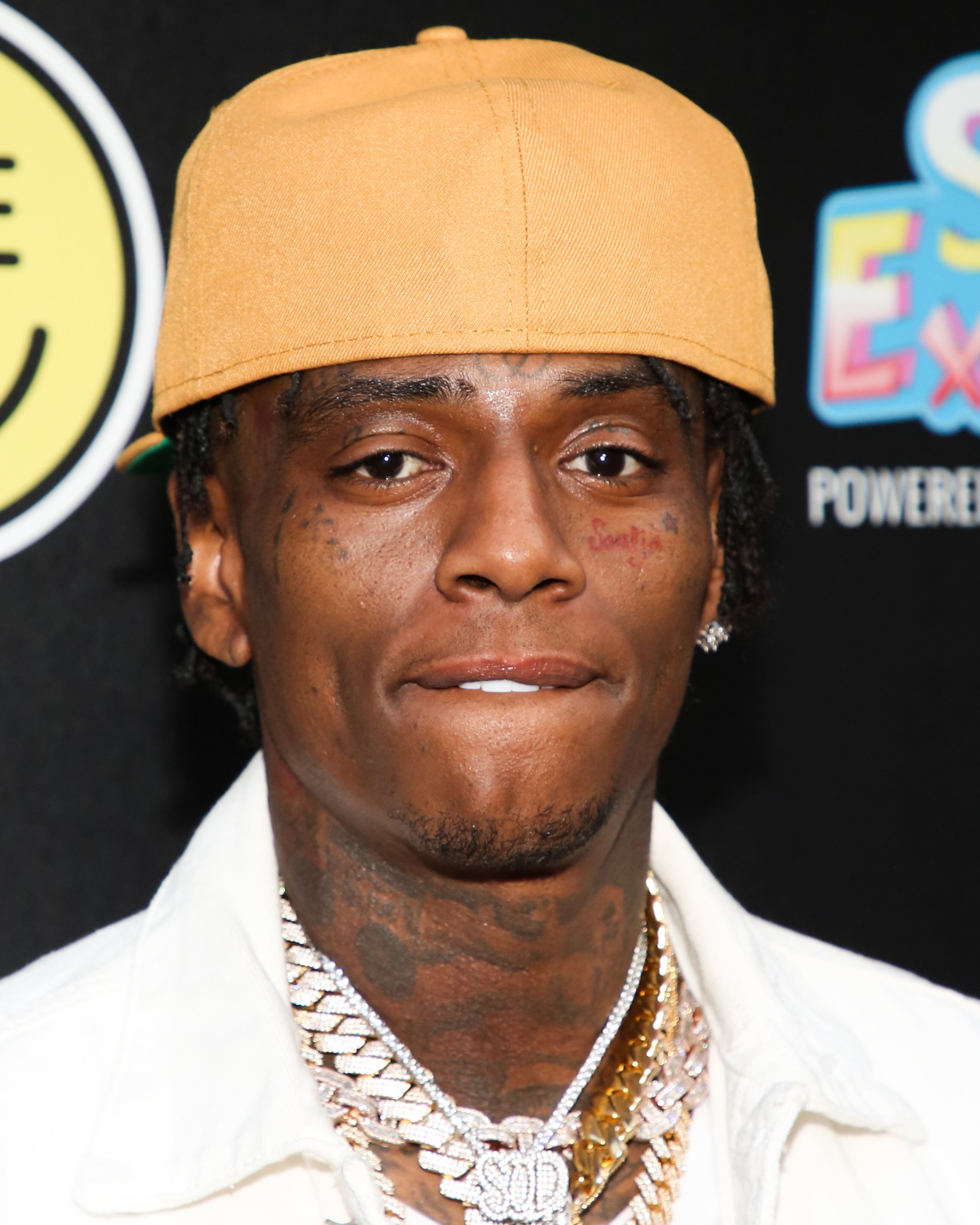 Soulja Boy posing for a picture at his 32nd birthday celebration in Hollywood, California on July 28, 2022 | Source: Getty Images 