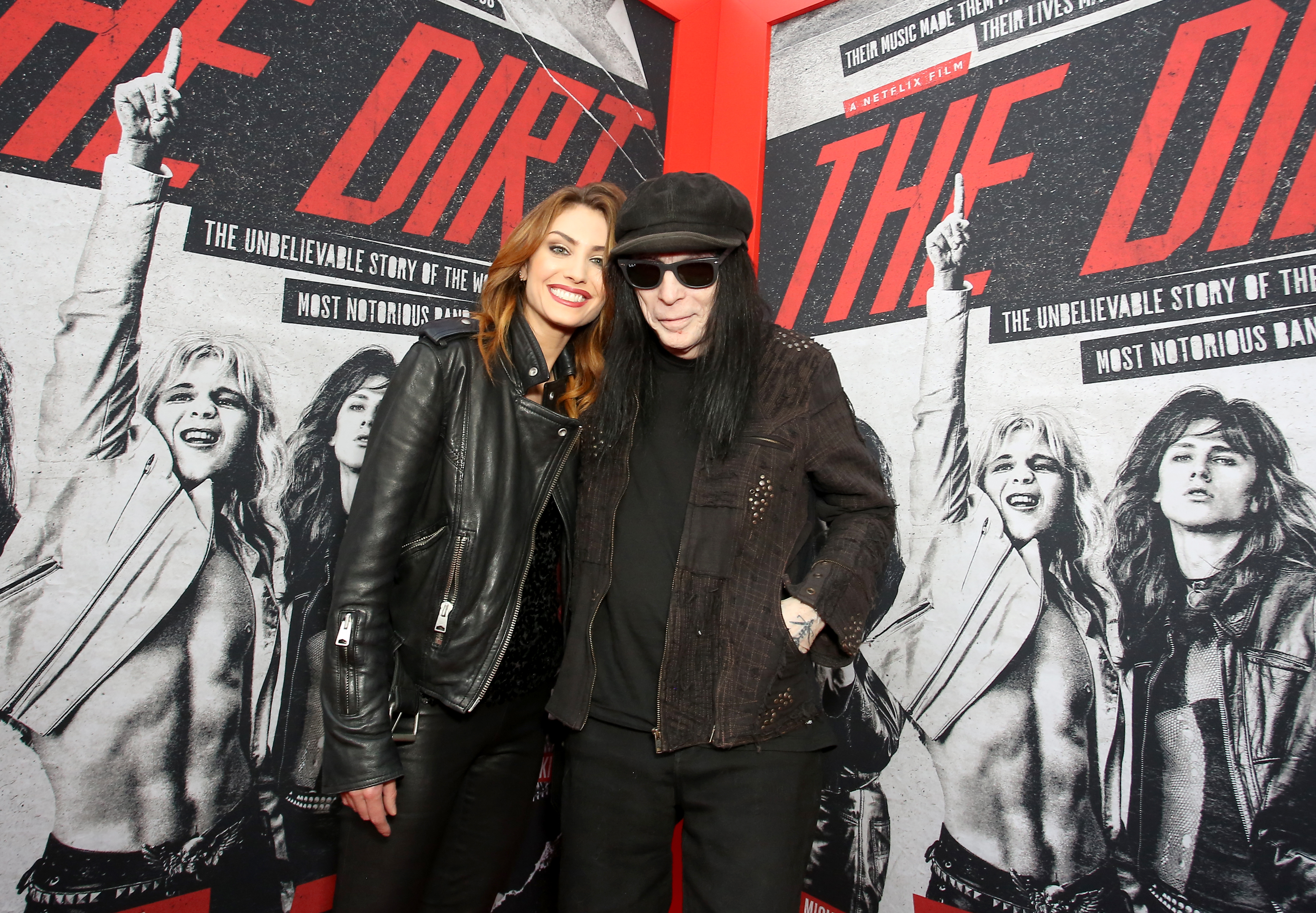 Seraina Schönenberger and Mick Mars pose at the premiere of Netflix's 'The Dirt" at the Arclight Hollywood on March 18, 2019, in Hollywood, California | Source: Getty Images
