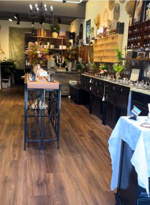 The video shows the interior of a specialty retail store, with shelves lined with bottles, decorative flowers, and neatly arranged merchandise during Amanda "Mandy" Karolkiewicz's trip to China with her daughters. | Source: TikTok/mandykarolk