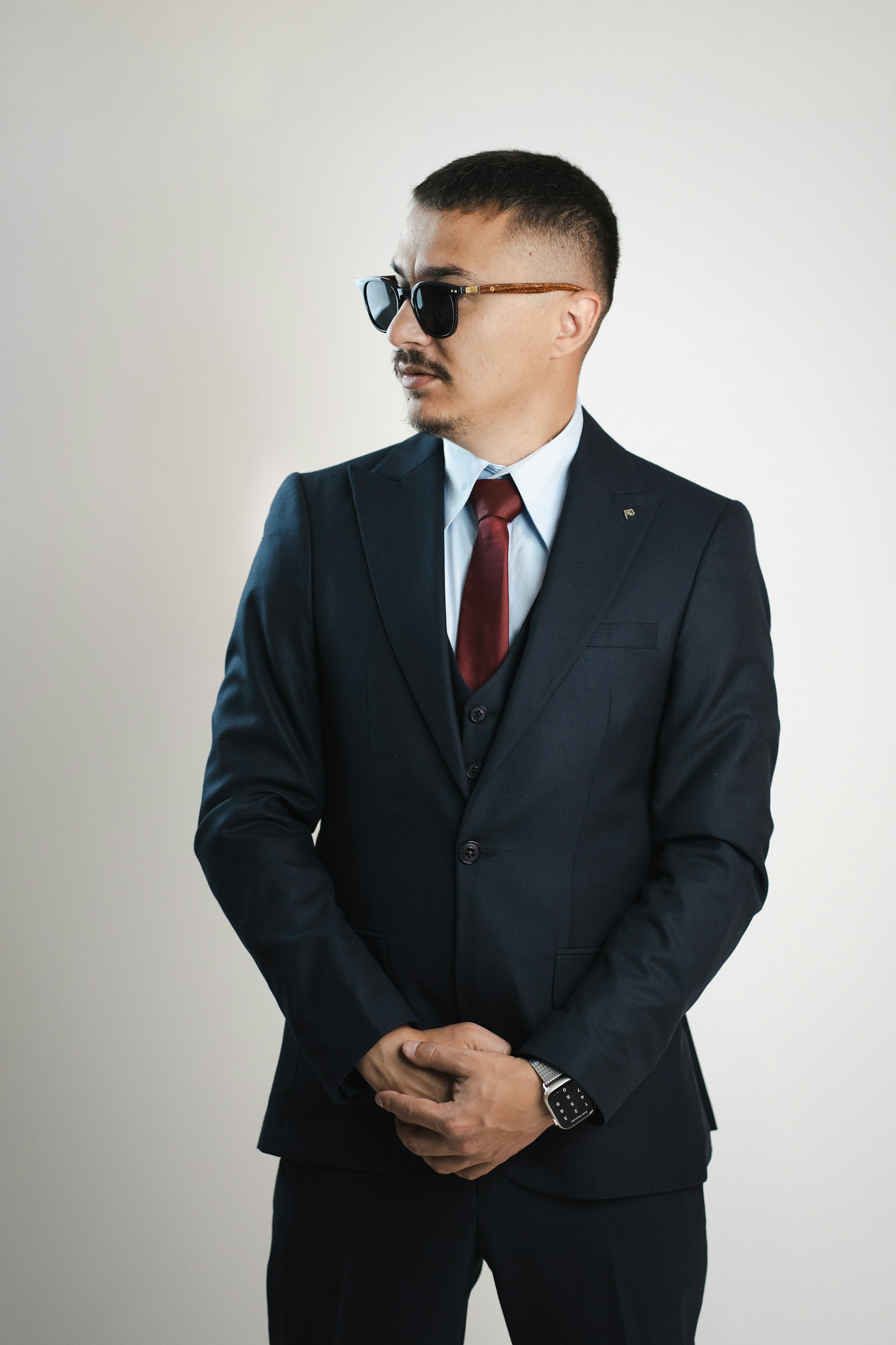 A man in a dark suit | Source: Unsplash