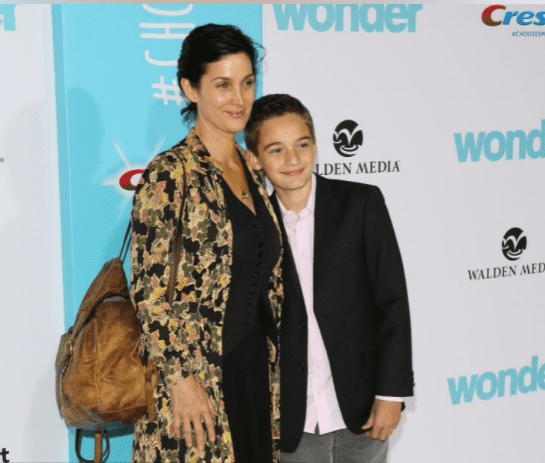 Carrie-Anne Moss and Jaden Roy attend the premiere of Lionsgate's 'Wonder' on November 14, 2017 in Los Angeles, California | Photo: Getty Images