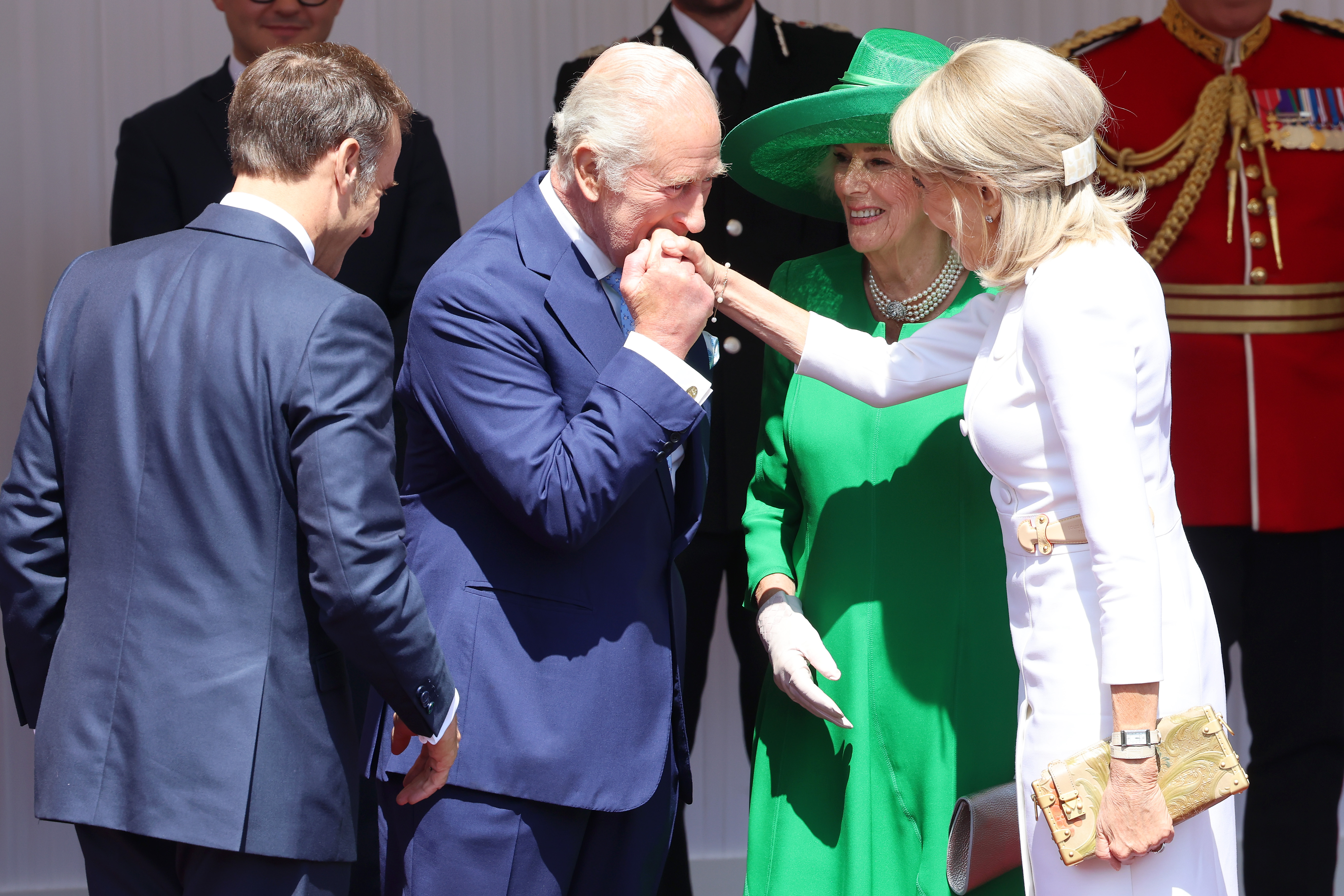 King Charles III kissing Brigitte Macron's hand at Datchet Road on July 8, 2025, in Windsor, England. | Source: Getty Images