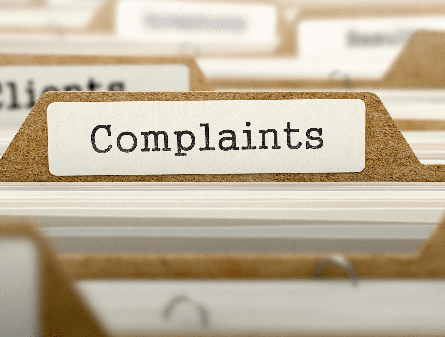 A cabinet displays a file of complaints | Photo: Shutterstock/ESB Professional