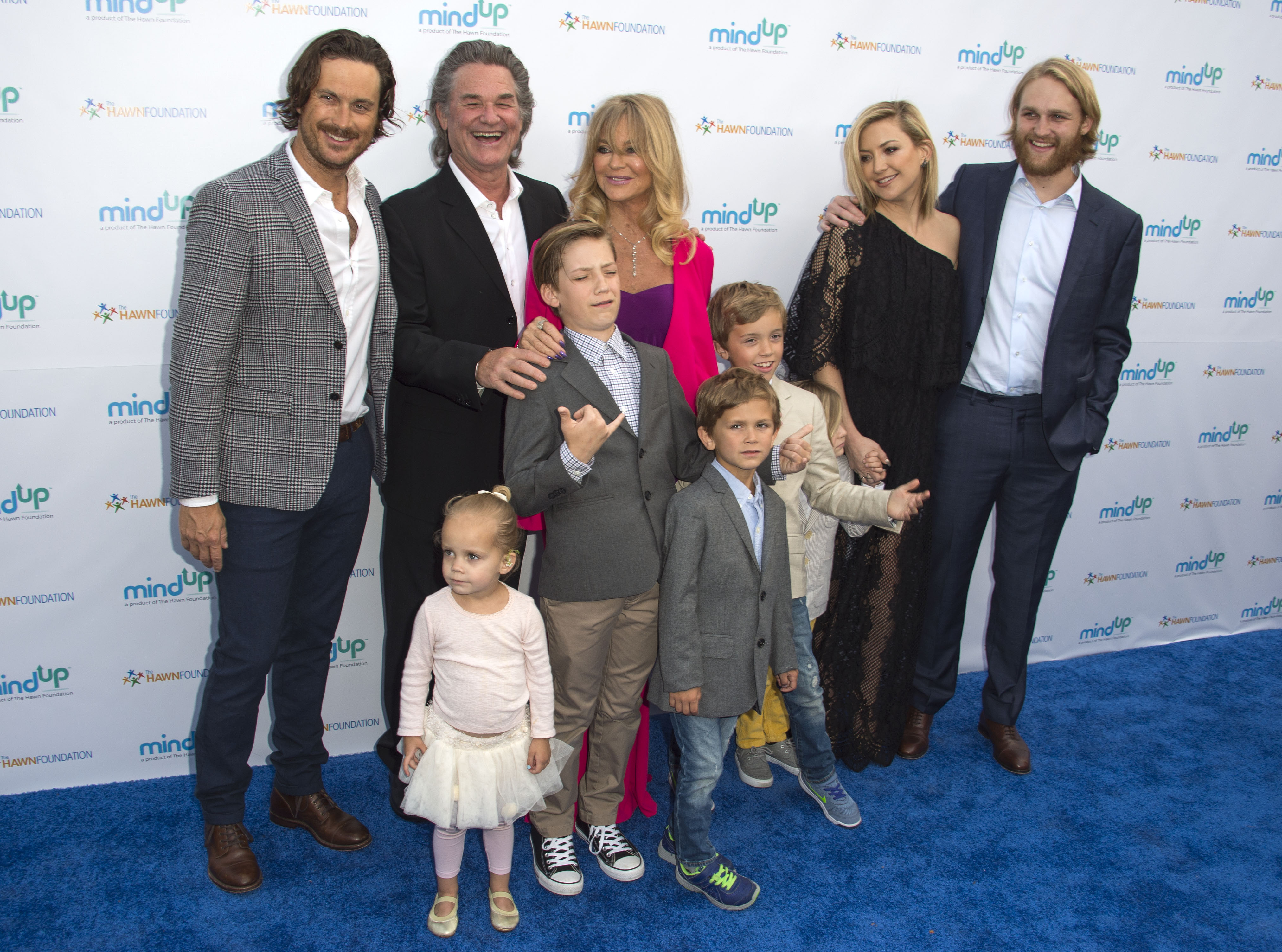Oliver Hudson, Kurt Russell, Goldie Hawn, Wyatt Russell, and Kate Hudson, and their children Ryder Robinson, Wilder, Bodhi, and Rio Hudson, as well as Bingham Bellamy, attend Goldie's Annual "Goldie's Love In for Kids" Event in Beverly Hills, California, on May 6, 2016. | Source: Getty Images