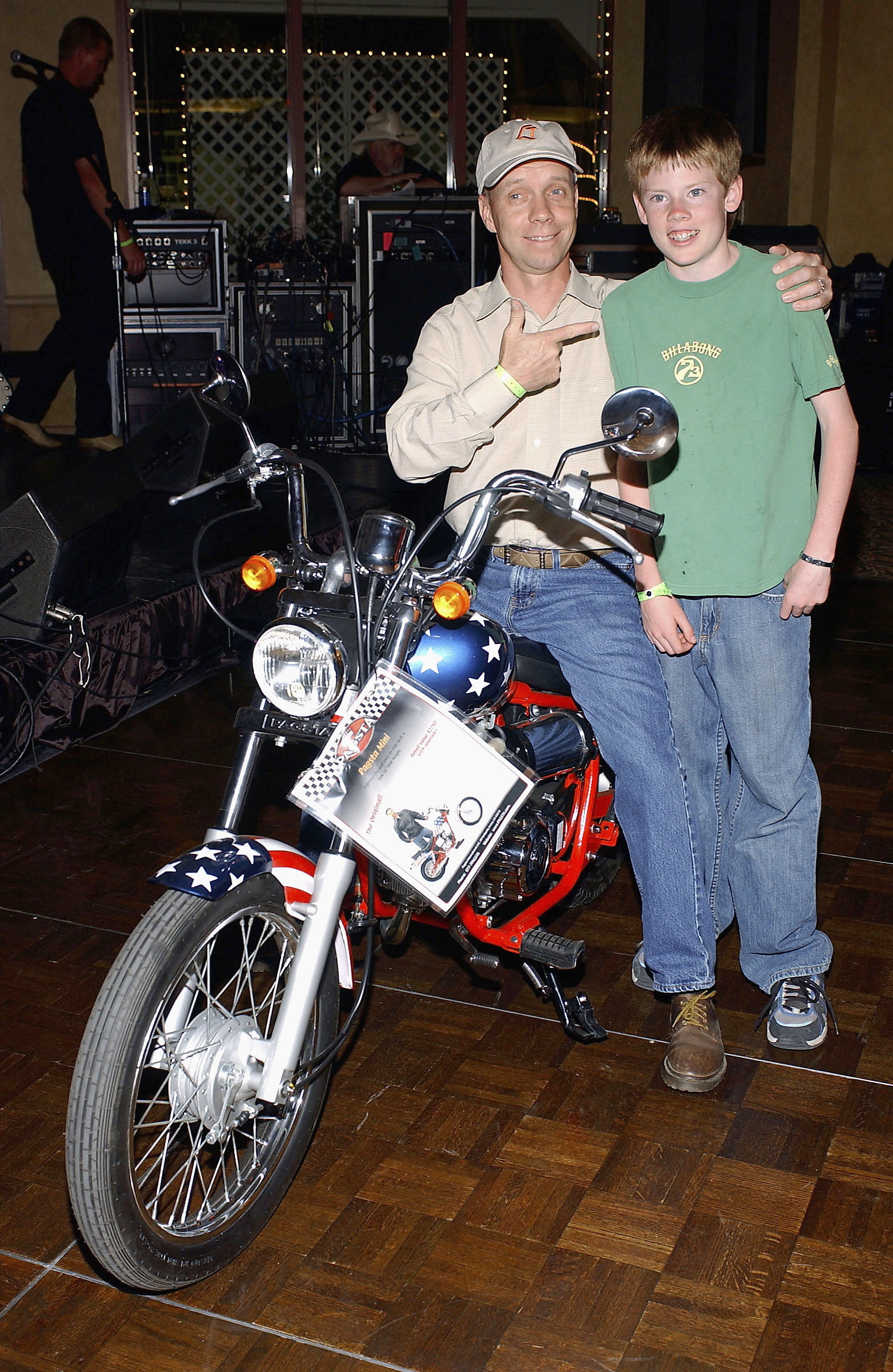Scott Hamilton and his son Charlie pose at the 14th Annual Hollywood Charity Horse Show on May 1, 2004 in Burbank, California | Source: Getty Images