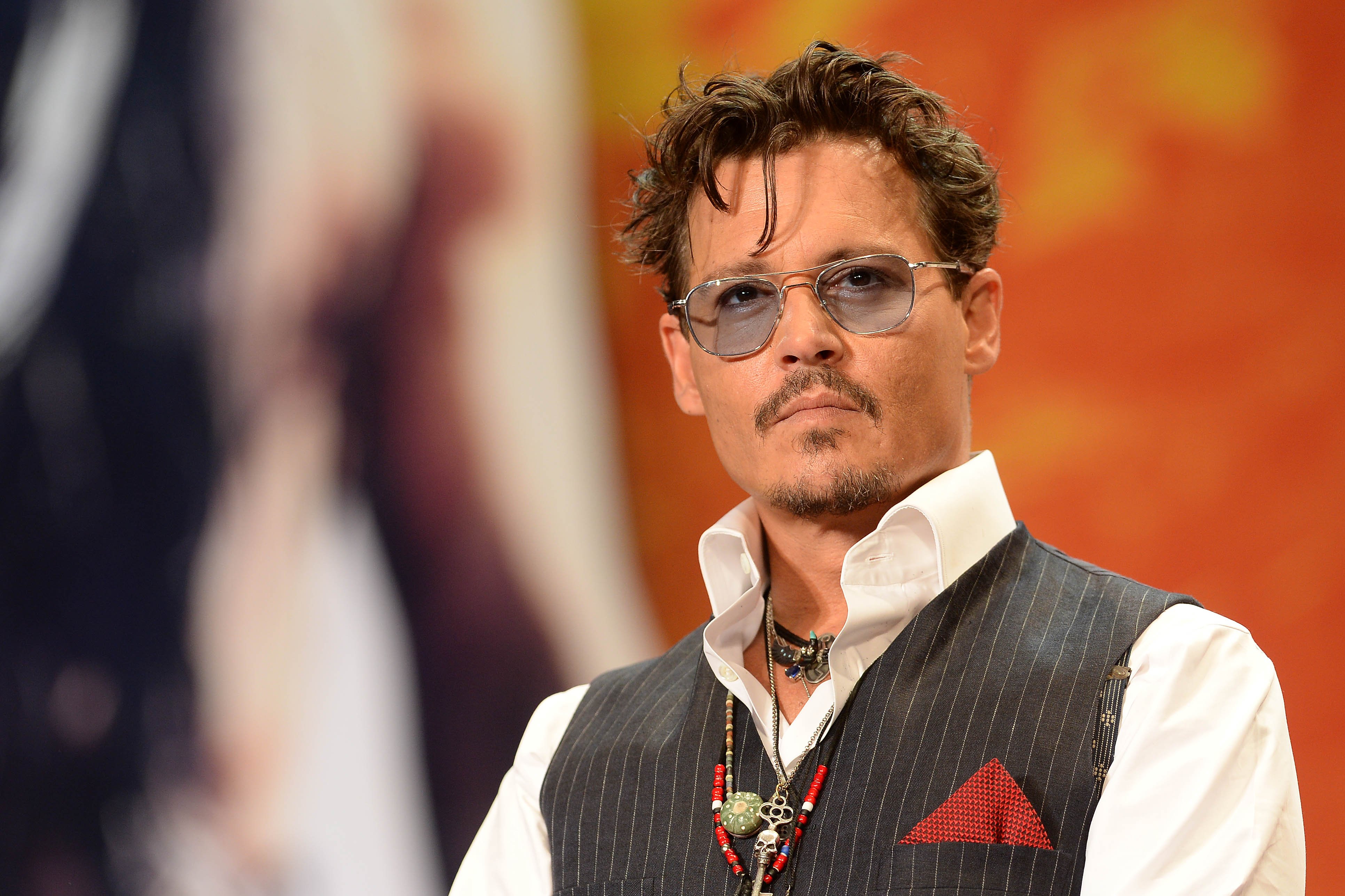 Johnny Depp attends the "Lone Ranger" Japan premiere at Roppongi Hills in Tokyo, Japan on July 17, 2013. | Source: Getty Images