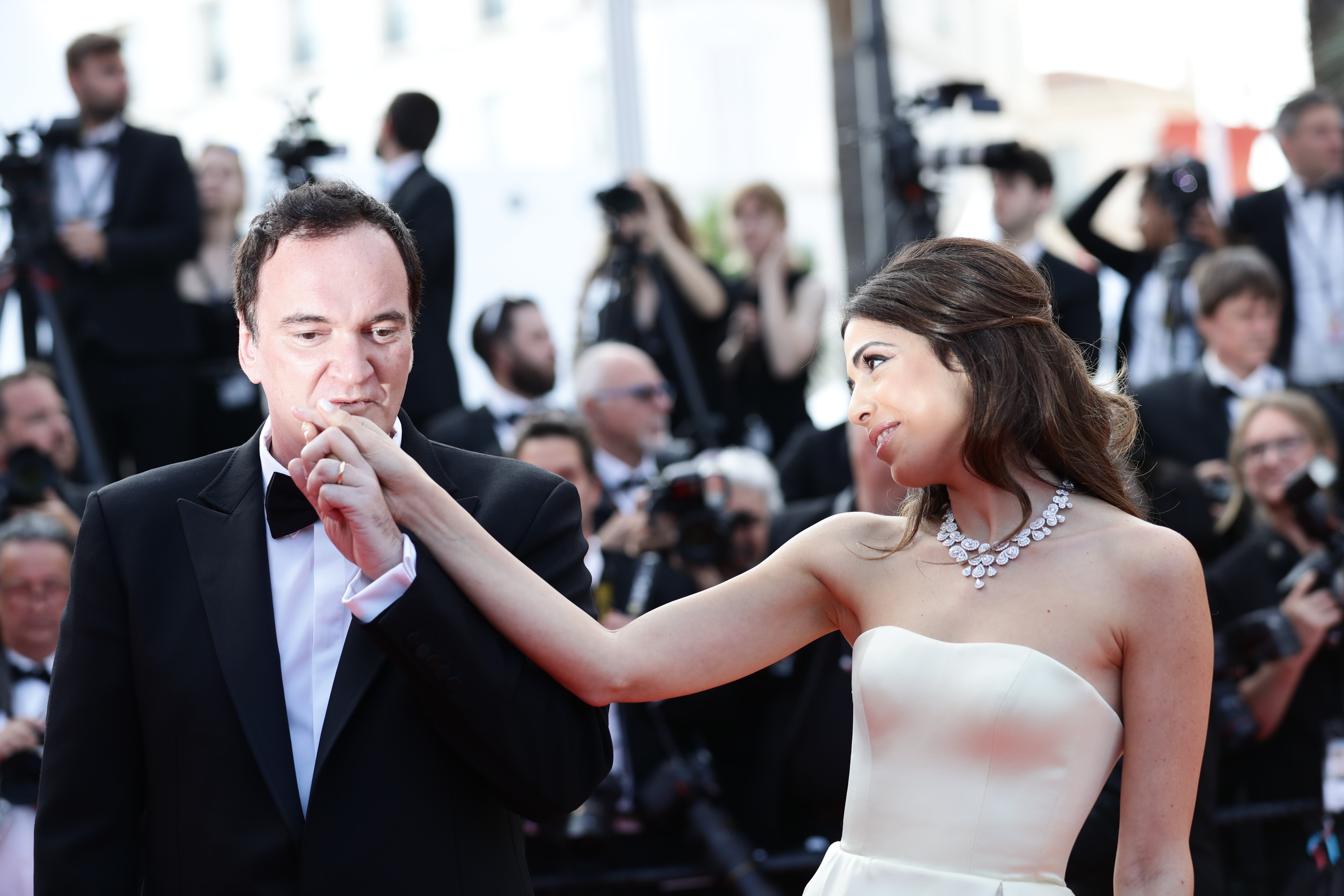Quentin Tarantino and Daniella Pick attending the closing ceremony screening of "The Specials" during the 72nd annual Cannes Film Festival on May 25, 2019 in Cannes, France.┃Source: Getty Images