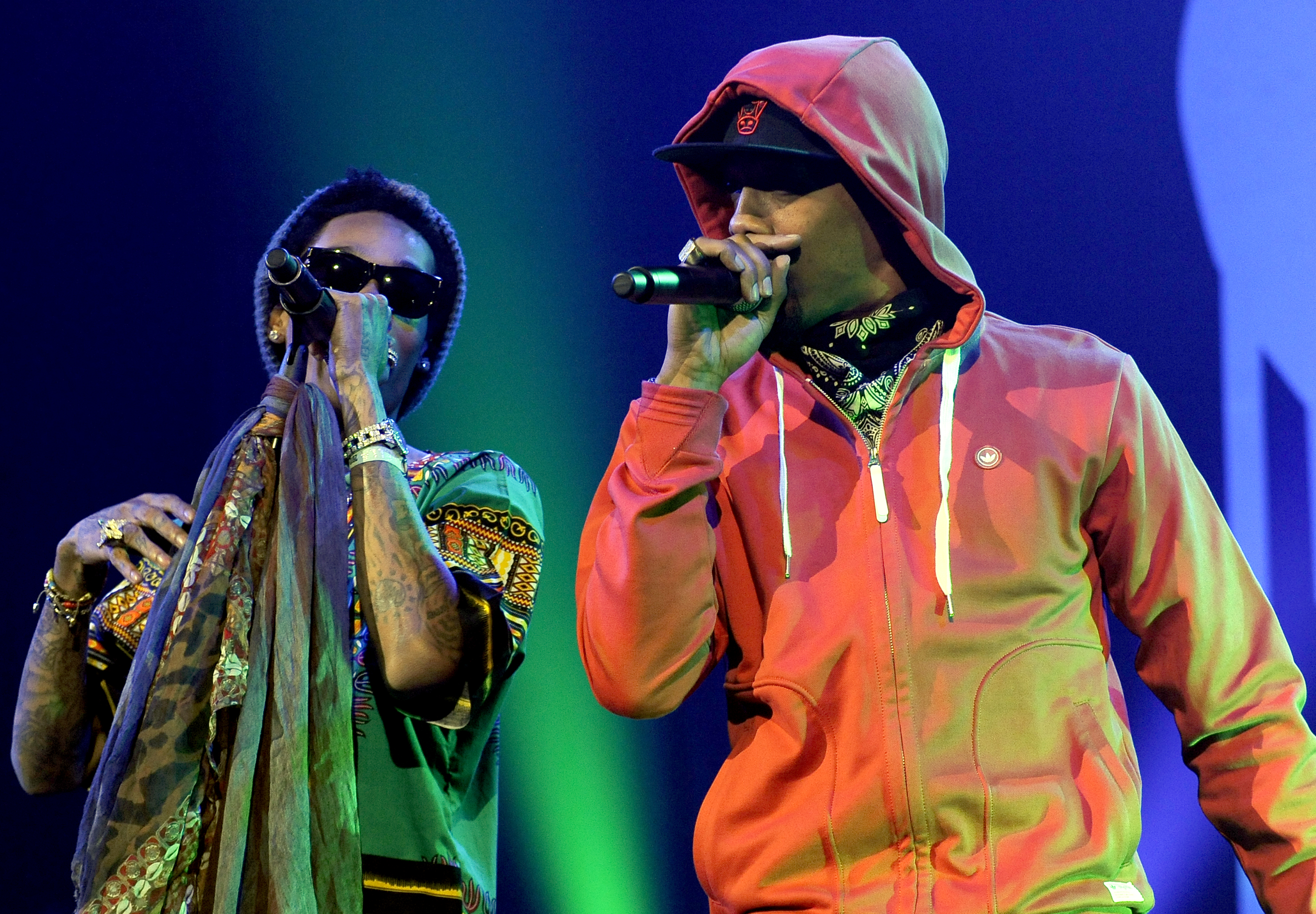 Wiz Khalifa and Chevy Woods perform as part of Wiz Khalifa's 4-20 Bake Off concert at the Bill Graham Civic Auditorium on April 20, 2012, in San Francisco, California. | Source: Getty Images