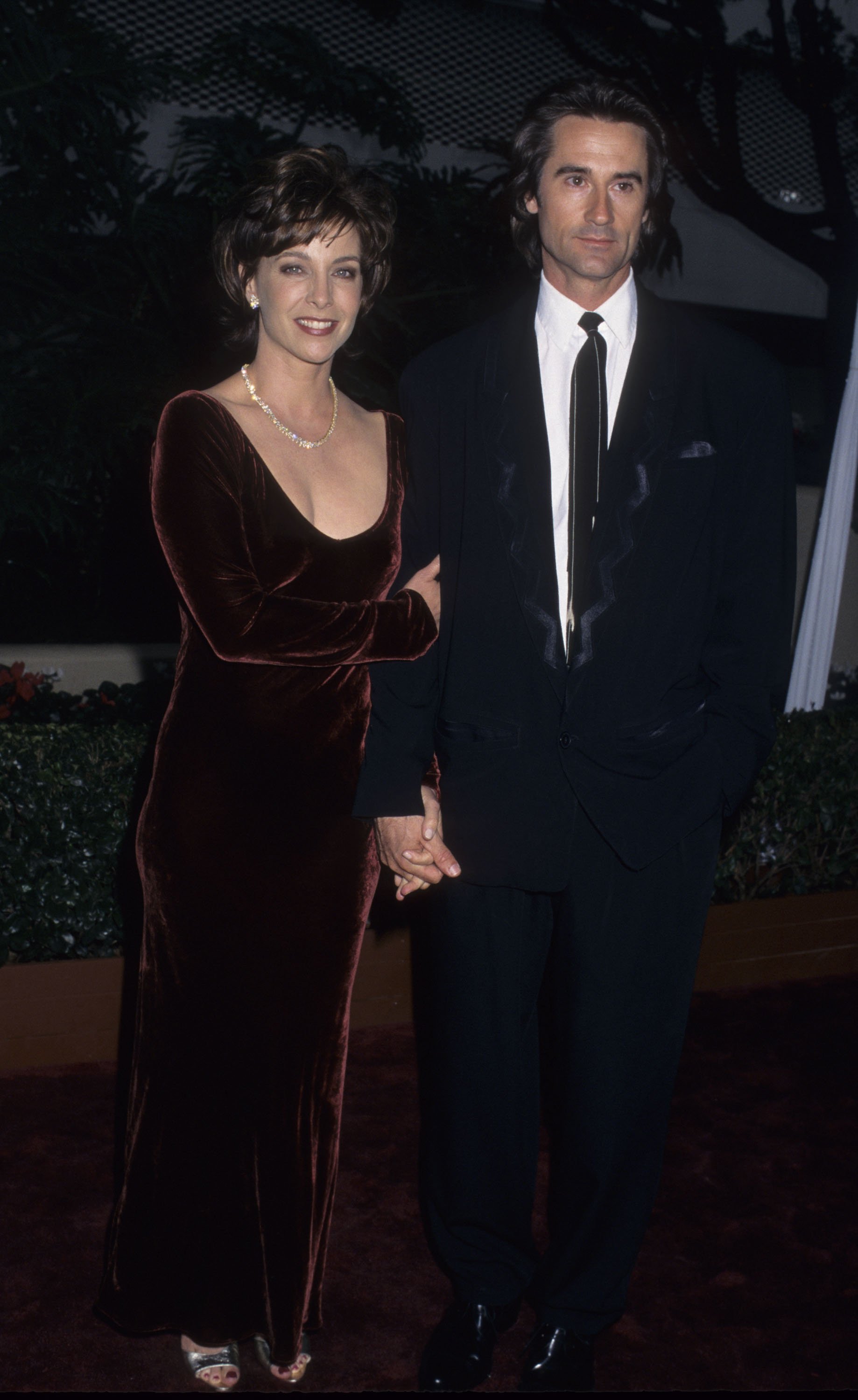Actress Kathleen Quinlan and actor Bruce Abbott attend 53rd Annual Golden Globe Awards on January 21, 1996 at the Beverly Hilton Hotel in Beverly Hills, California. | Source: Getty Images