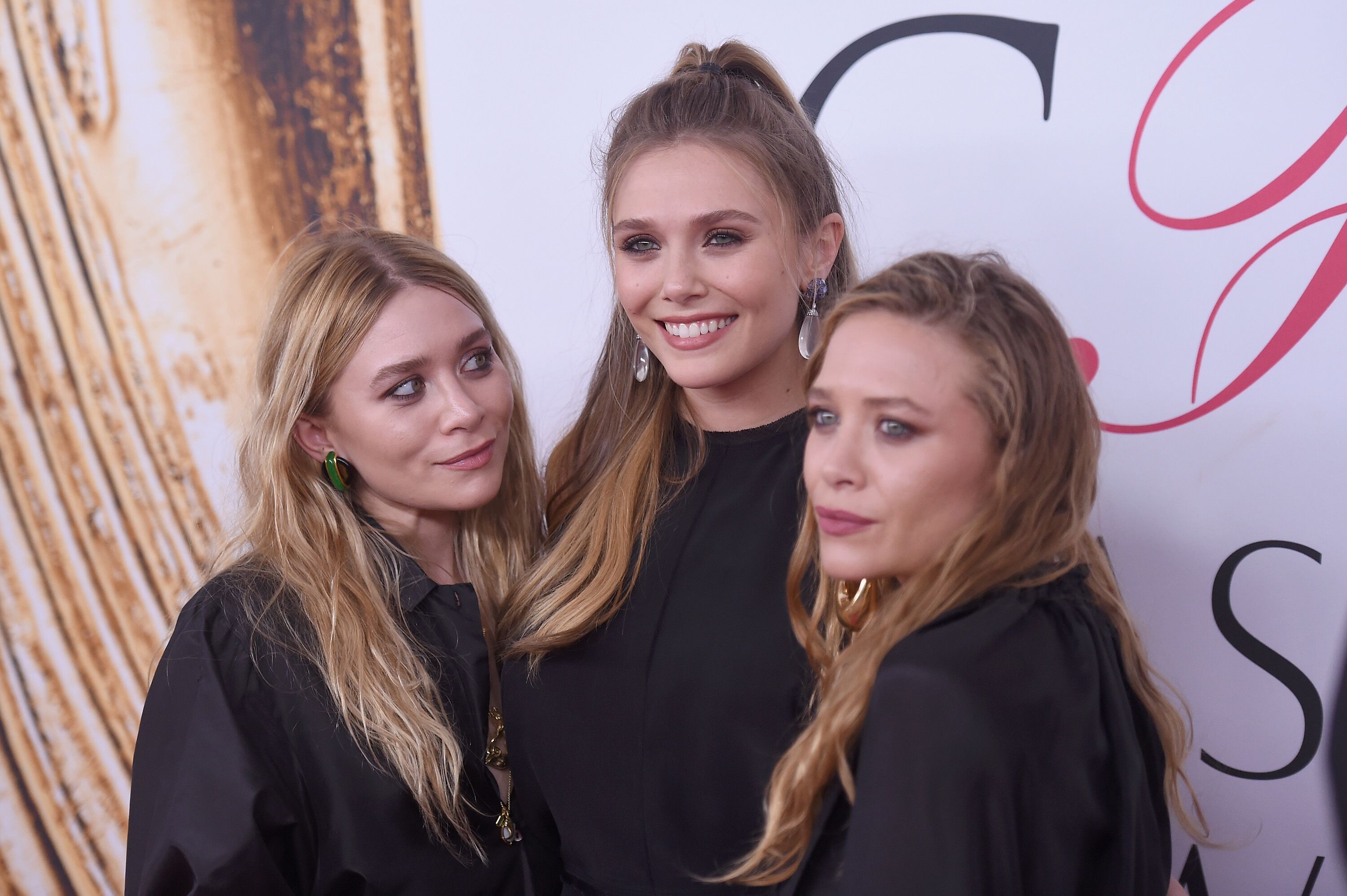 Elizabeth, Mary-Kate and Ashley Olsen at the 2016 CFDA Fashion Awards in New York | Source: Getty Images