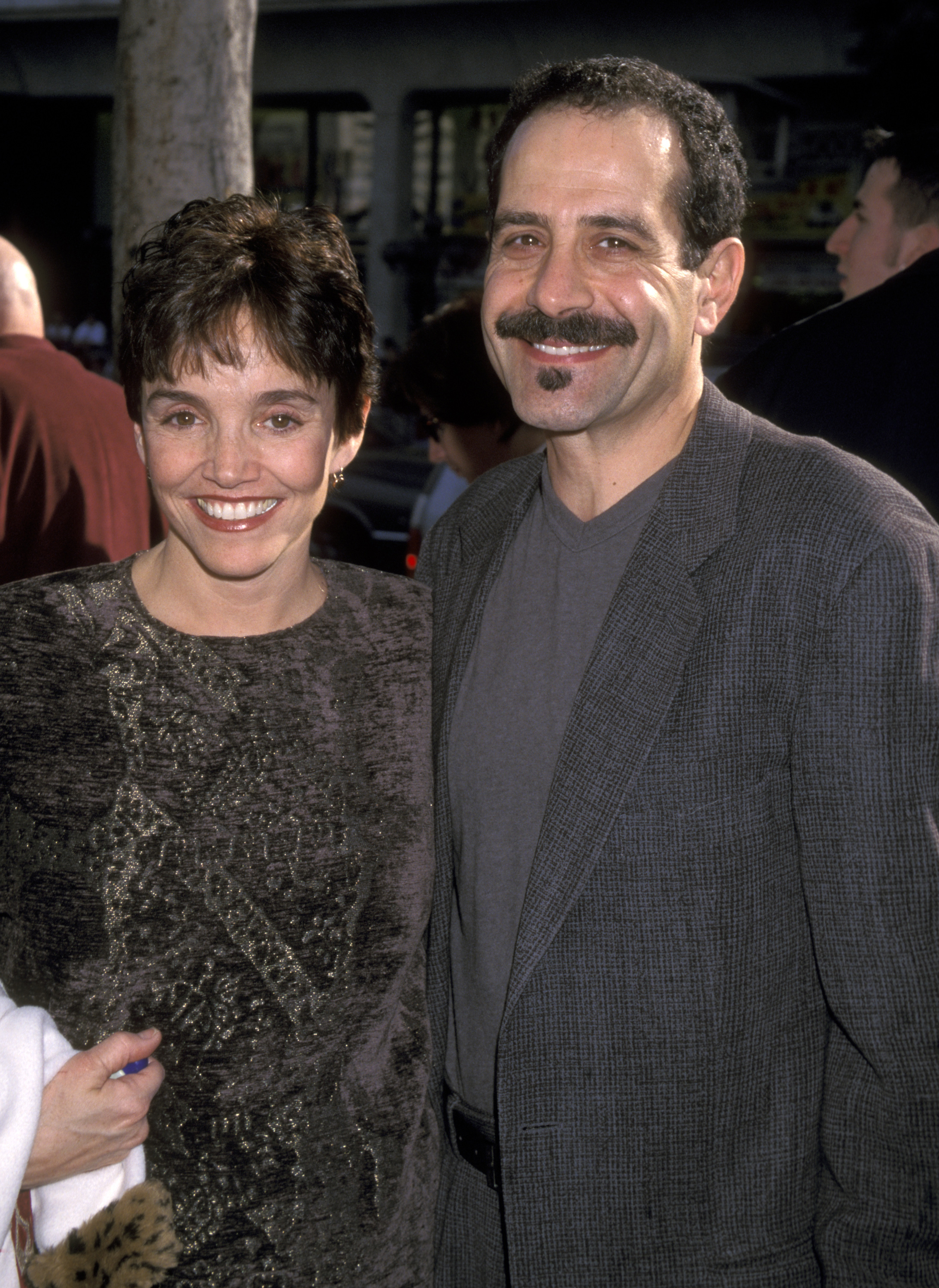 The actress and Tony Shalhoub at "Galaxy Quest" premiere on December 19, 1999, in Hollywood, California. | Source: Getty Images