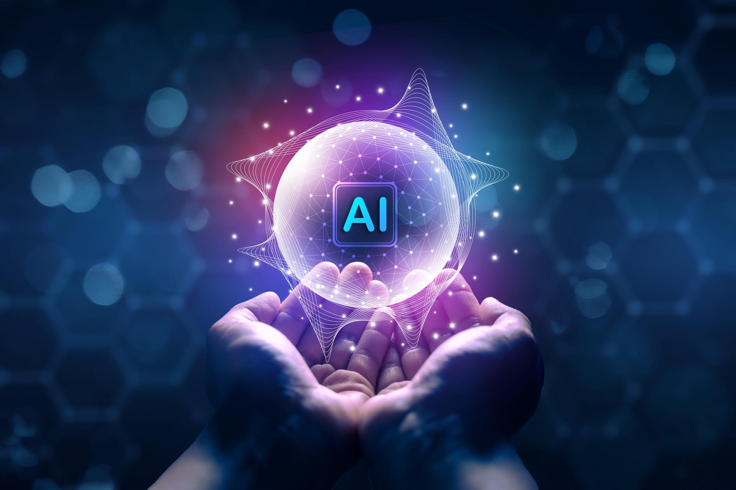 A human hand holding an Artificial Intelligence (AI) sphere in digital space. | Source: Getty Images