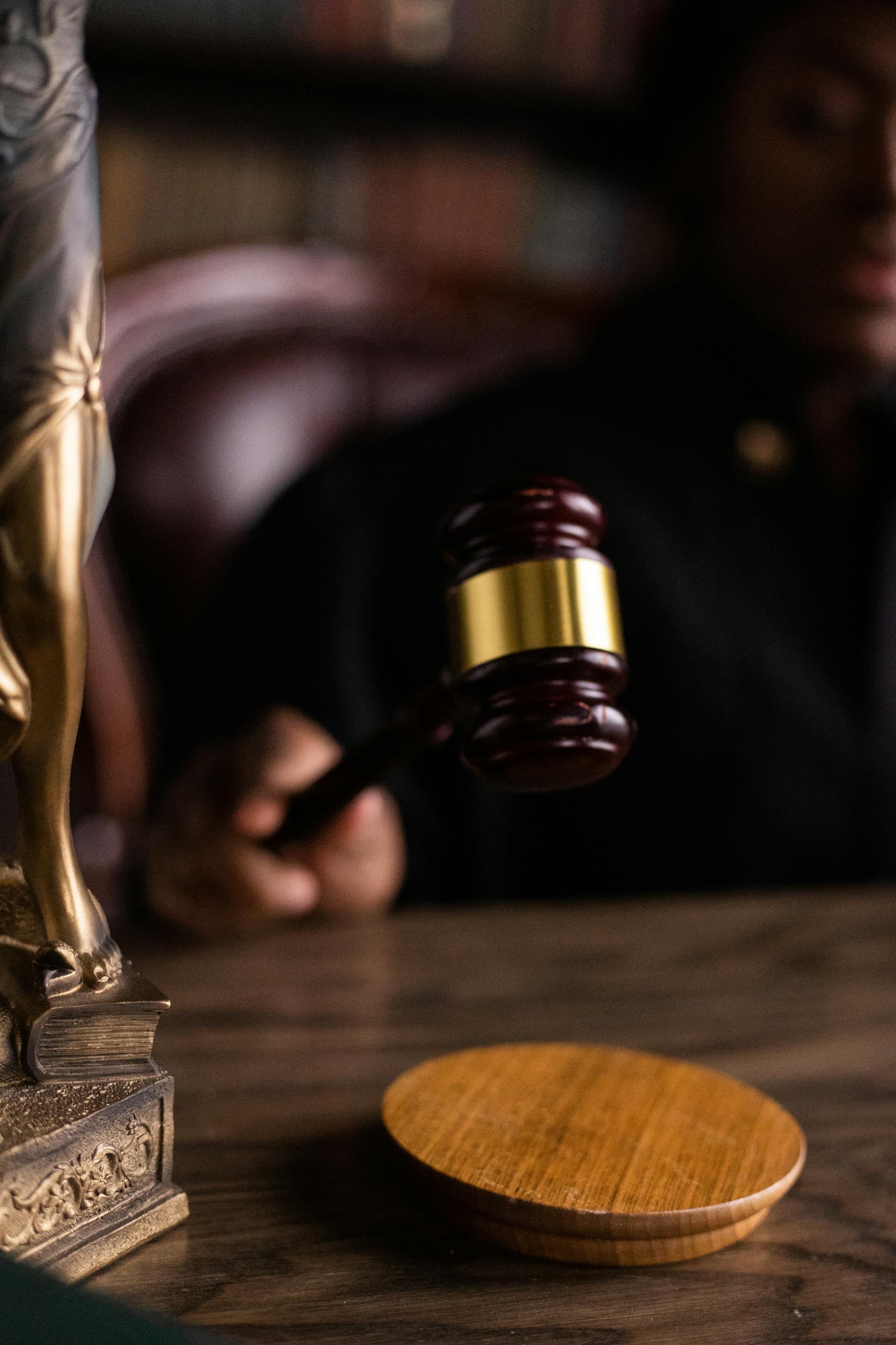 A person holding a gavel | Source: Pexels