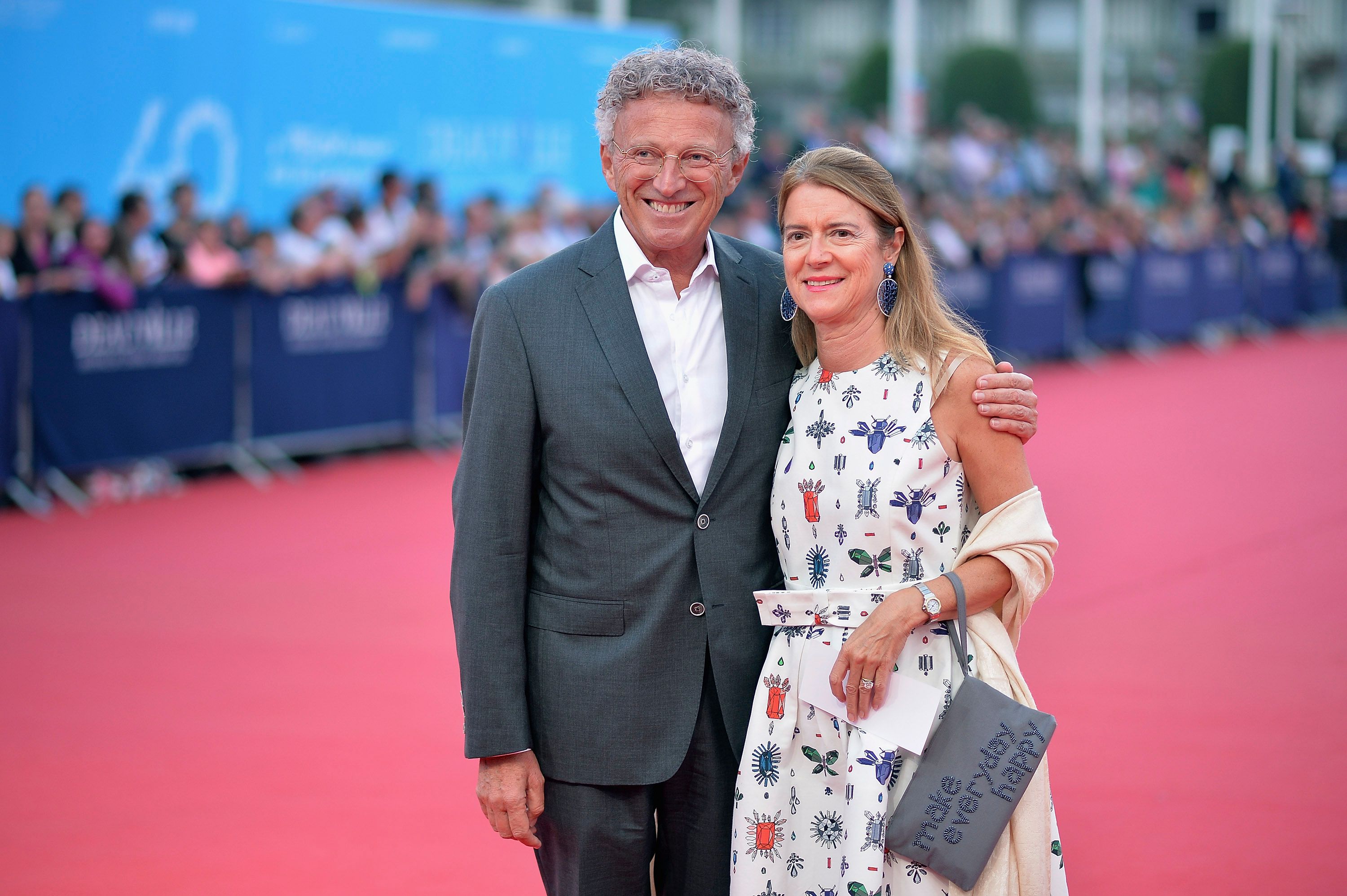 Dominique Monfort et Nelson Monfort arrivent à la première de 'Hundred Foot Journey' lors du 40e Festival du Film Américain de Deauville le 6 septembre 2014 à Deauville, France. | Photo : Getty Images