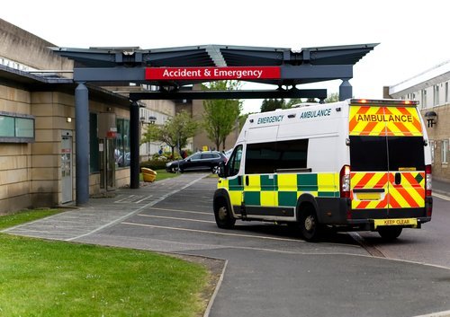 An ambulance drives into an Accident & Emergency ward of a hospital. | Source: Shutterstock