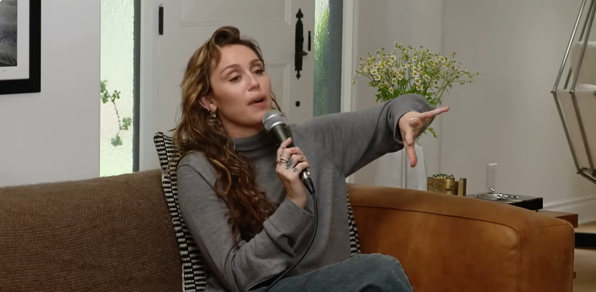 Miley Cyrus speaks on her family's podcast, as seen from a video post dated June 19, 2025. | Source: YouTube/SorryWe'reCyrus