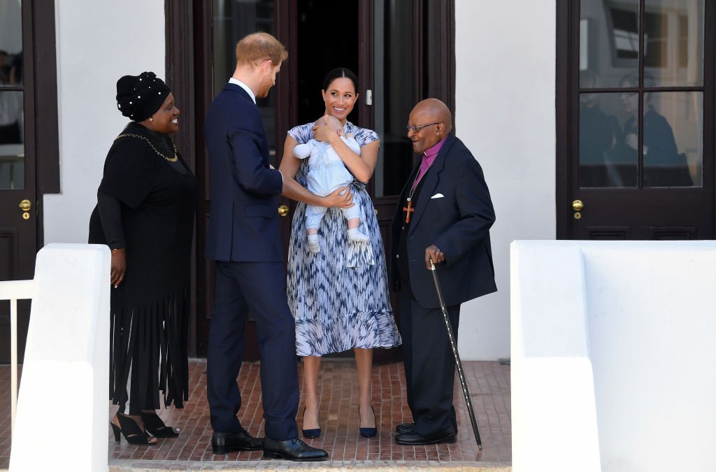  Prince Harry, Meghan, and their baby son Archie Mountbatten-Windsor meet Archbishop Desmond Tutu and his daughter Thandeka Tutu-Gxashe at the Desmond & Leah Tutu Legacy Foundation. | Source: Getty Images