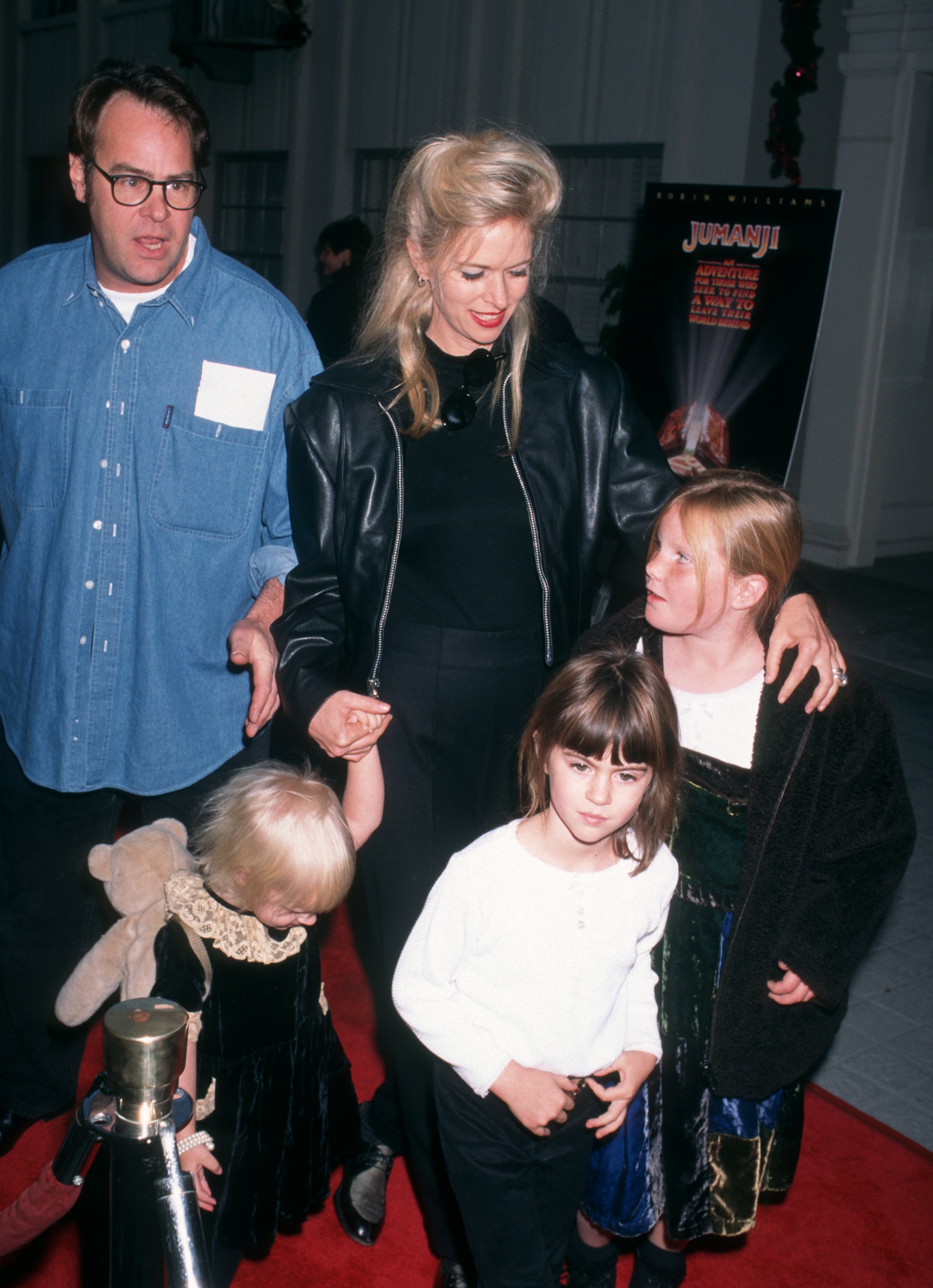 Actor Dan Aykroyd, actress Donna Dixon and daughters Danielle Aykroyd and Belle Aykroyd attend the world premiere of 'Jumanji' on December 10, 1995 at Sony Studios in Culver City, California. | Source: Getty Images