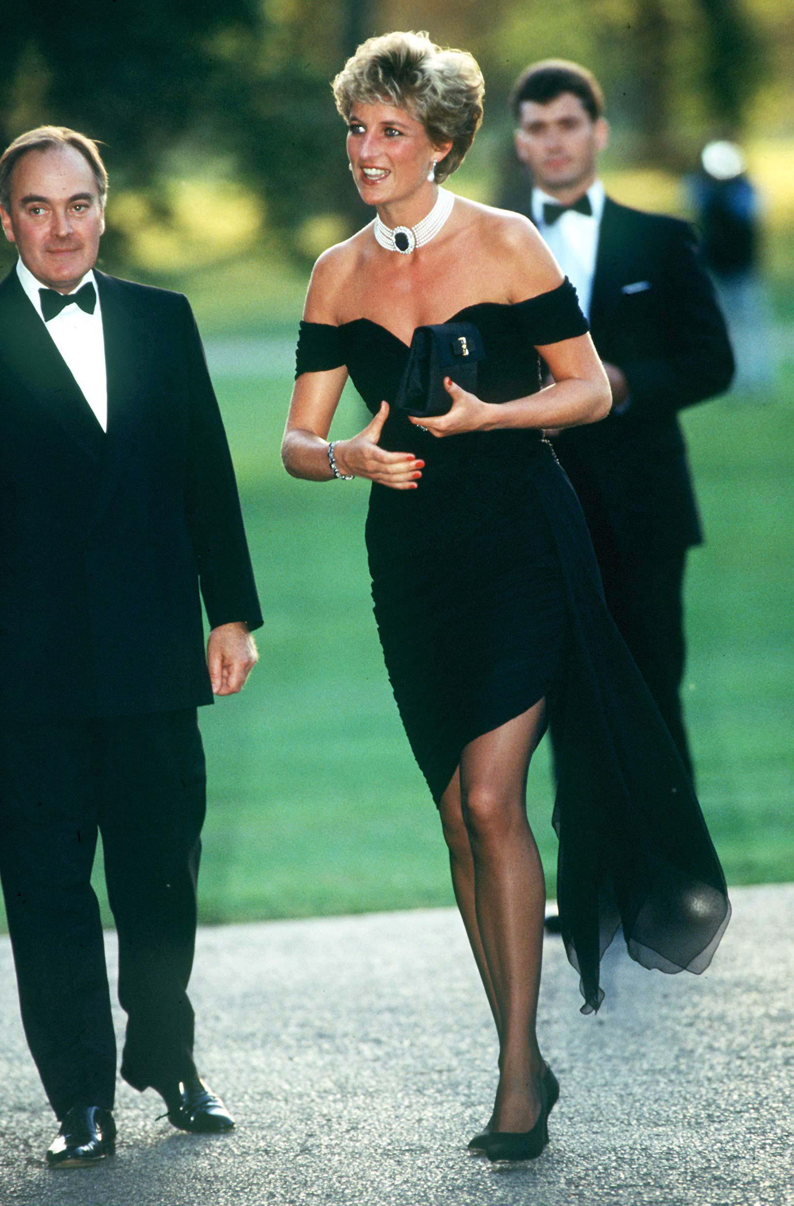 Princess Diana in the "revenge dress" created by Christina Stambolian, attending the Vanity Fair party at the Serpentine Gallery in London on June 29, 1994 | Source: Getty Images