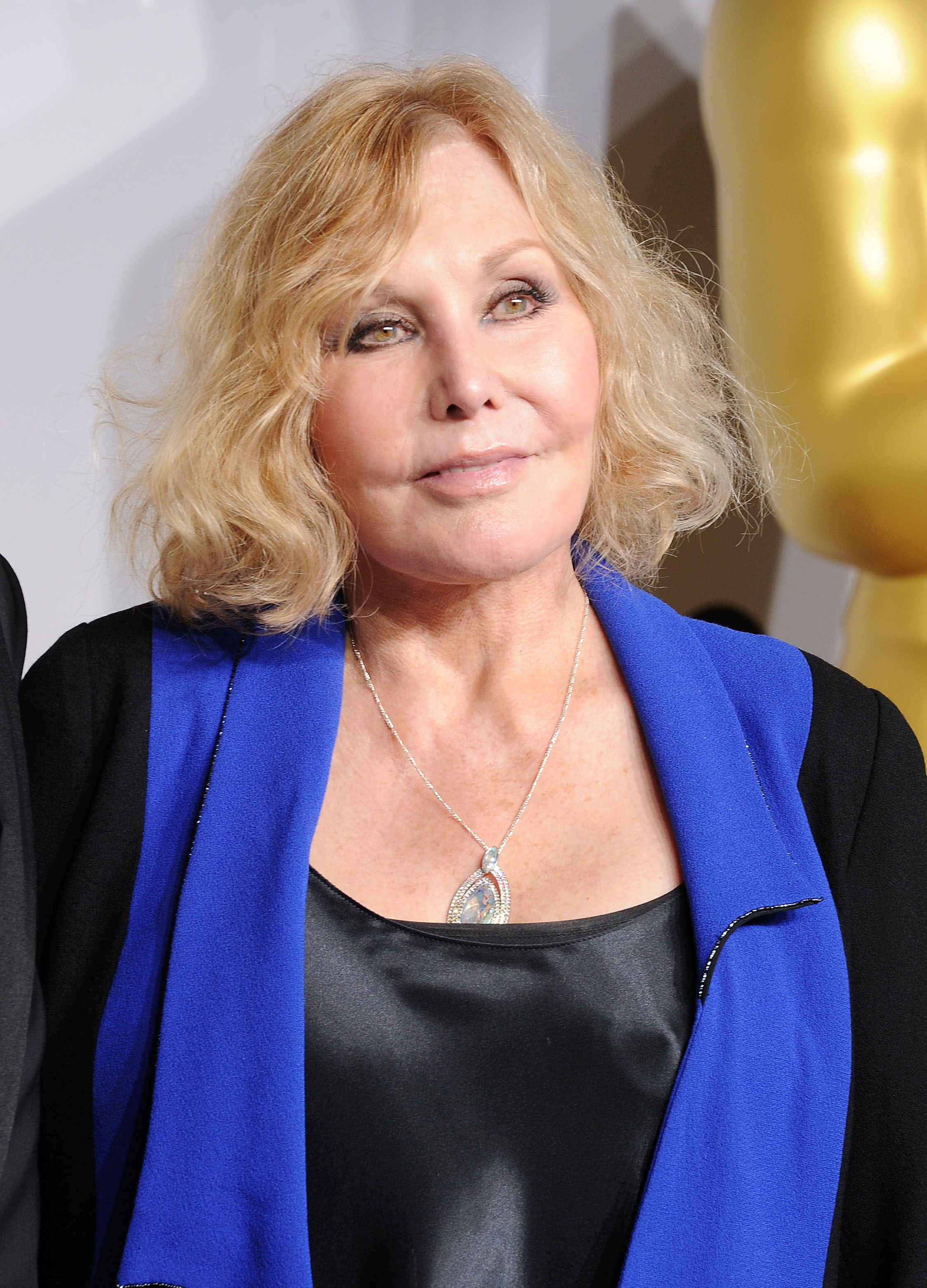 Kim Novak poses in the press room during the 86th Annual Academy Awards in Hollywood, California, on March 2, 2014. | Source: Getty Images