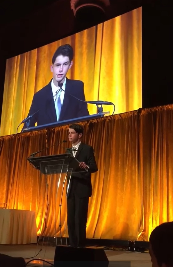 Screenshot of a video showing Dylan Douglas at a conference | Source: Facebook/Catherine Zeta-Jones