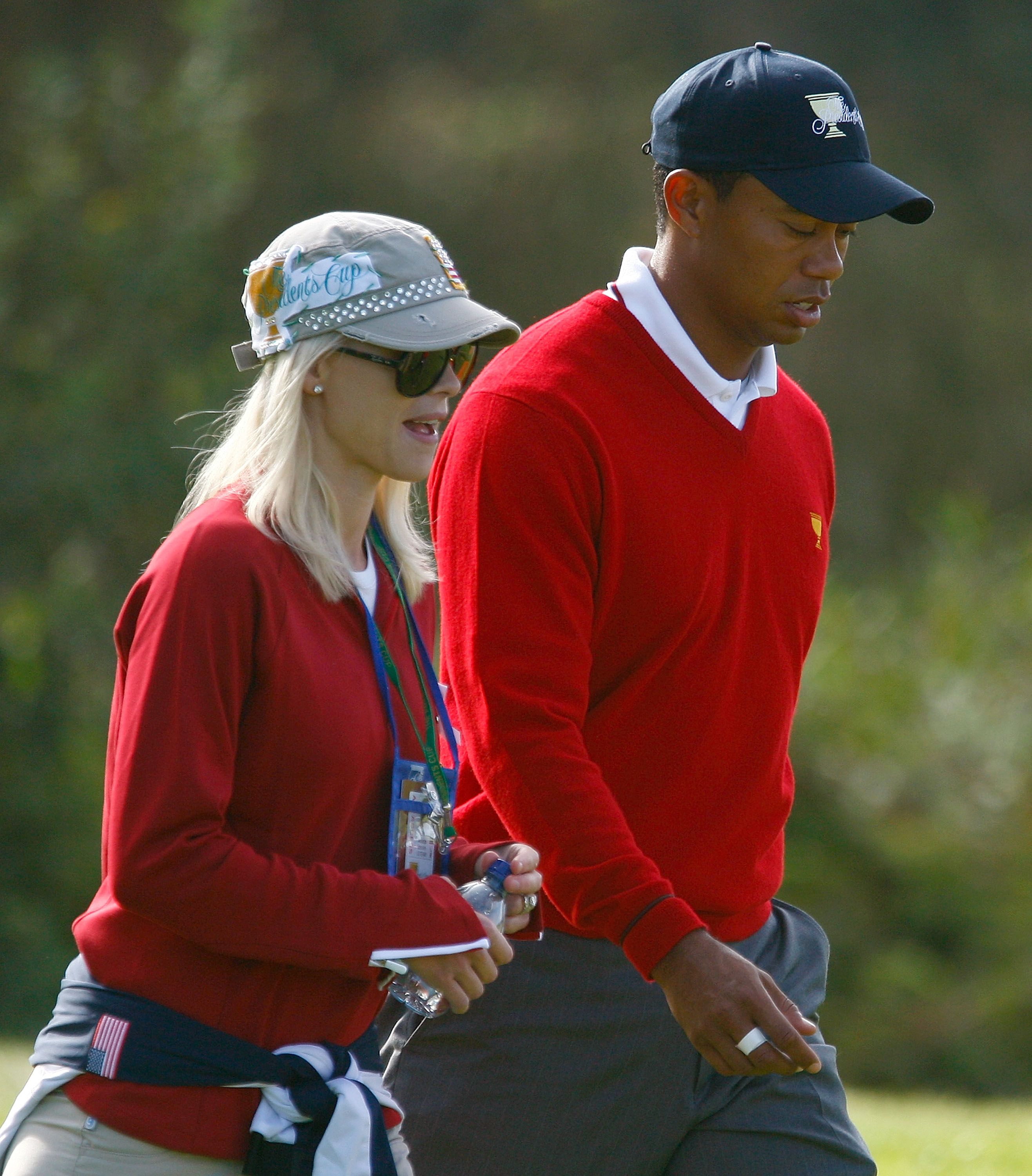 Tiger Woods and Elin Nordegren during the Day One Foursome Matches of The Presidents Cup at Harding Park Golf Course on October 8, 2009 in San Francisco, California. | Source: Getty Imags