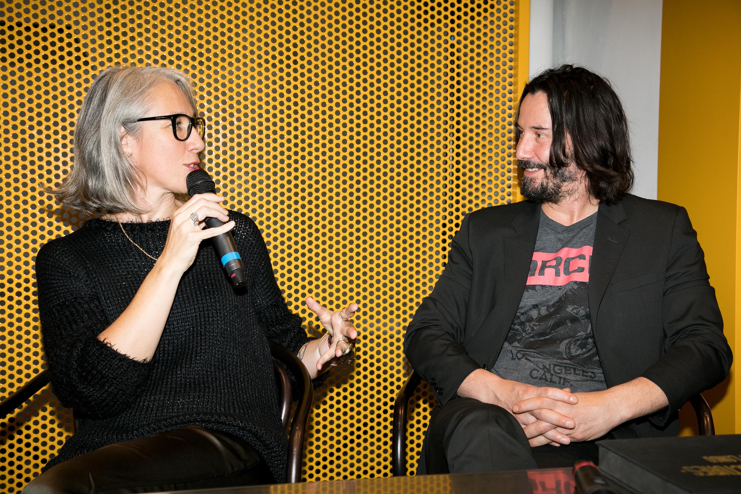 Alexandra Grant and Keanu Reeves at the X Artists' book launch at Palais De Tokyo in Paris, France on November 10, 2017. | Source: Getty Images