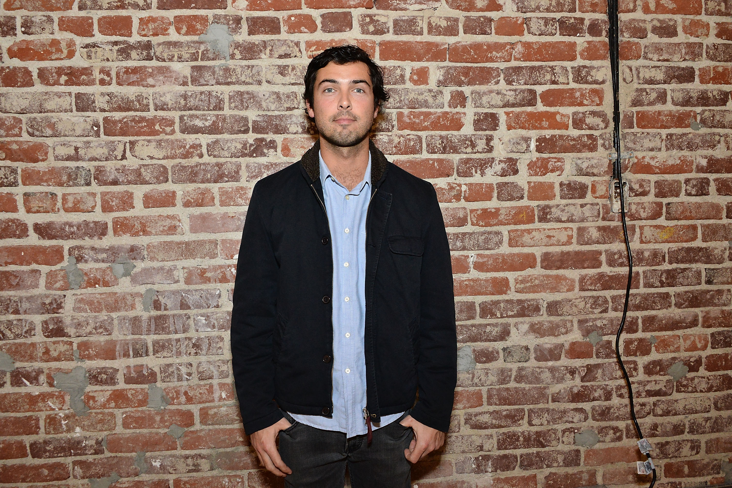 Caleb Wilding at the Sophie Caby and Ken Ehrlich artist reception and launch of Wilding Cran Gallery's Unit B on December 13, 2014, in Los Angeles, California | Source: Getty Images