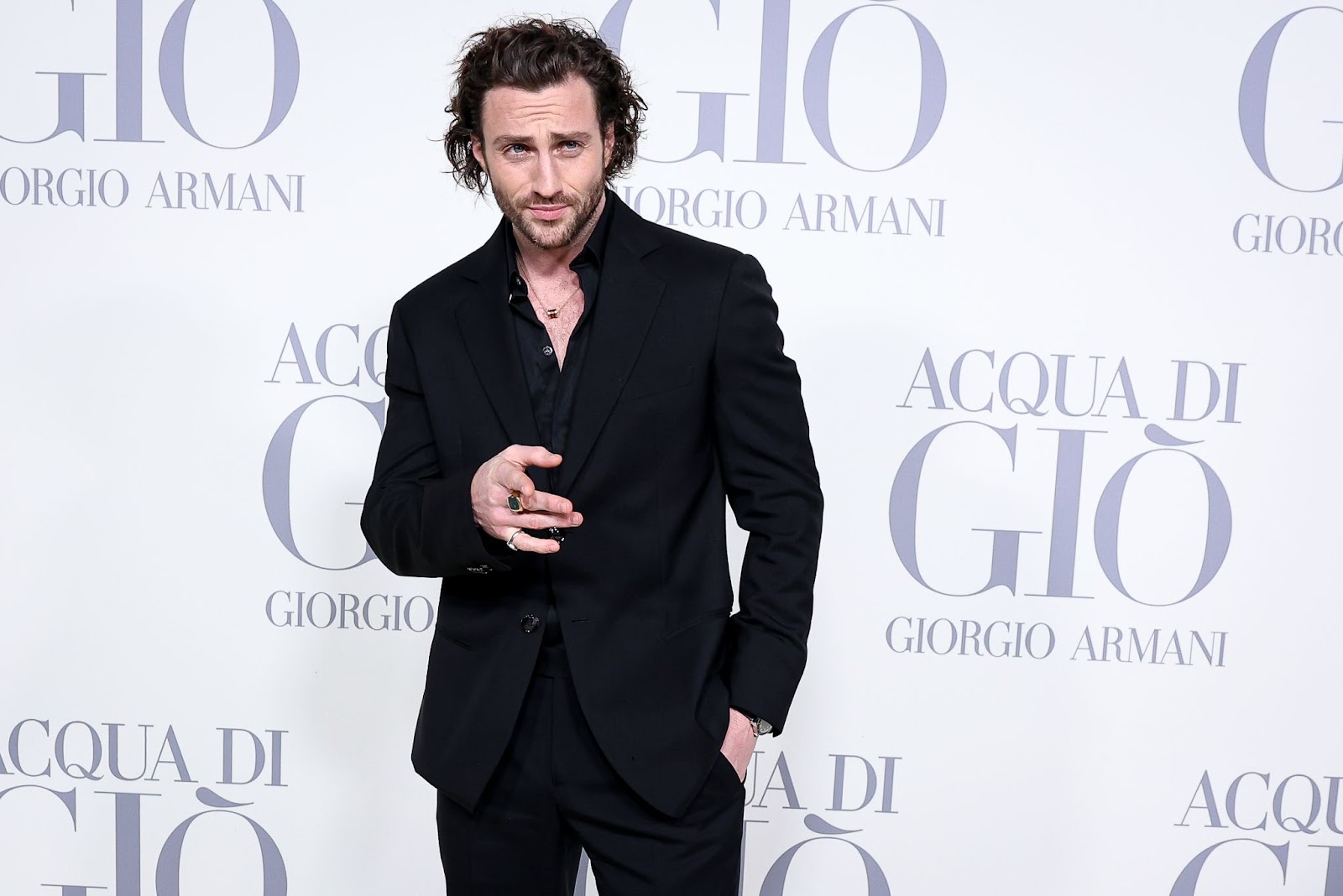 Aaron Taylor-Johnson at the Madrid photocall for "Acqua di Dio" by Giorgio Armani on March 7, 2024, in Spain. | Source: Getty Images