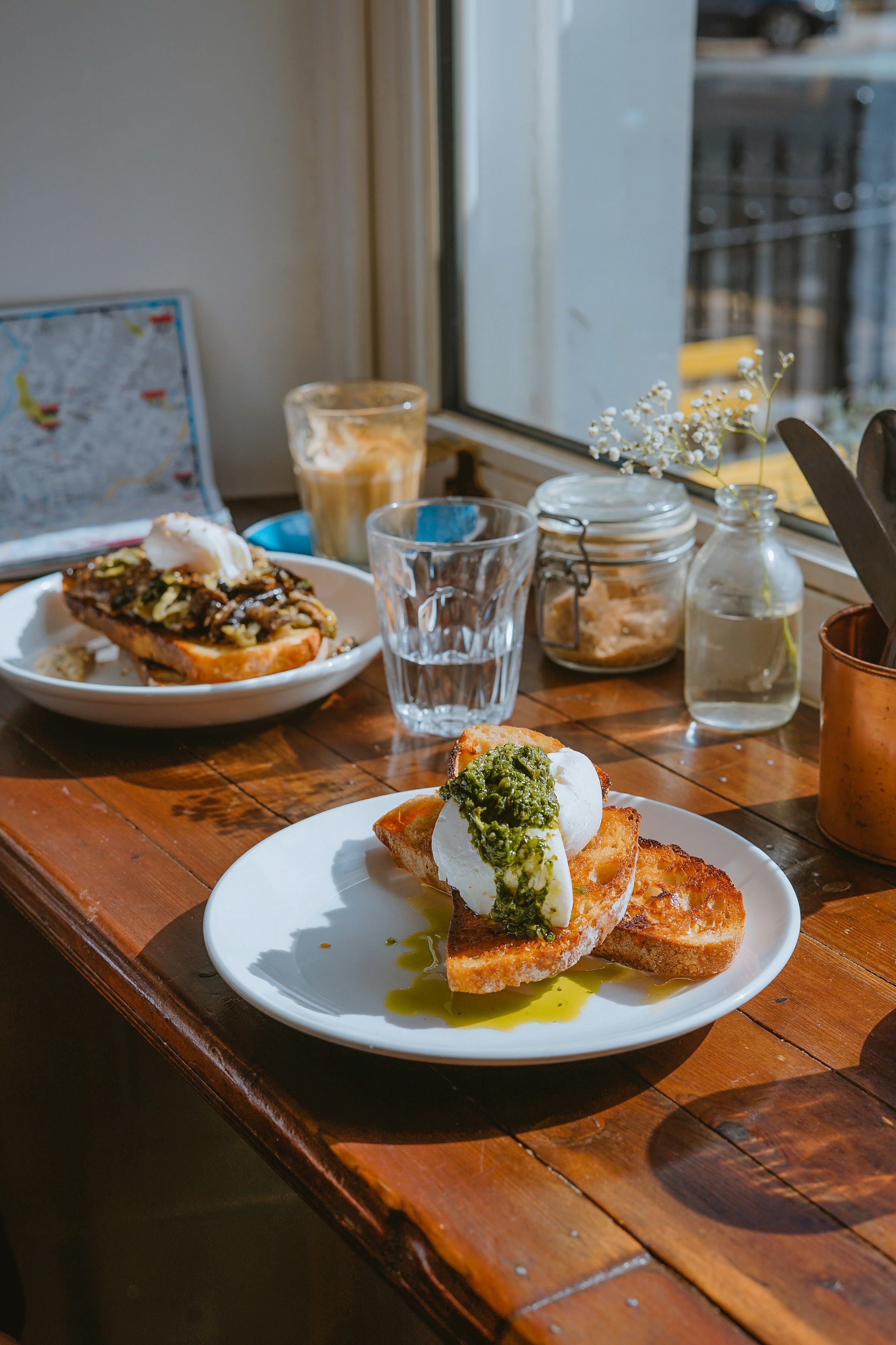 Two plates of food on a table | Source: Unsplash