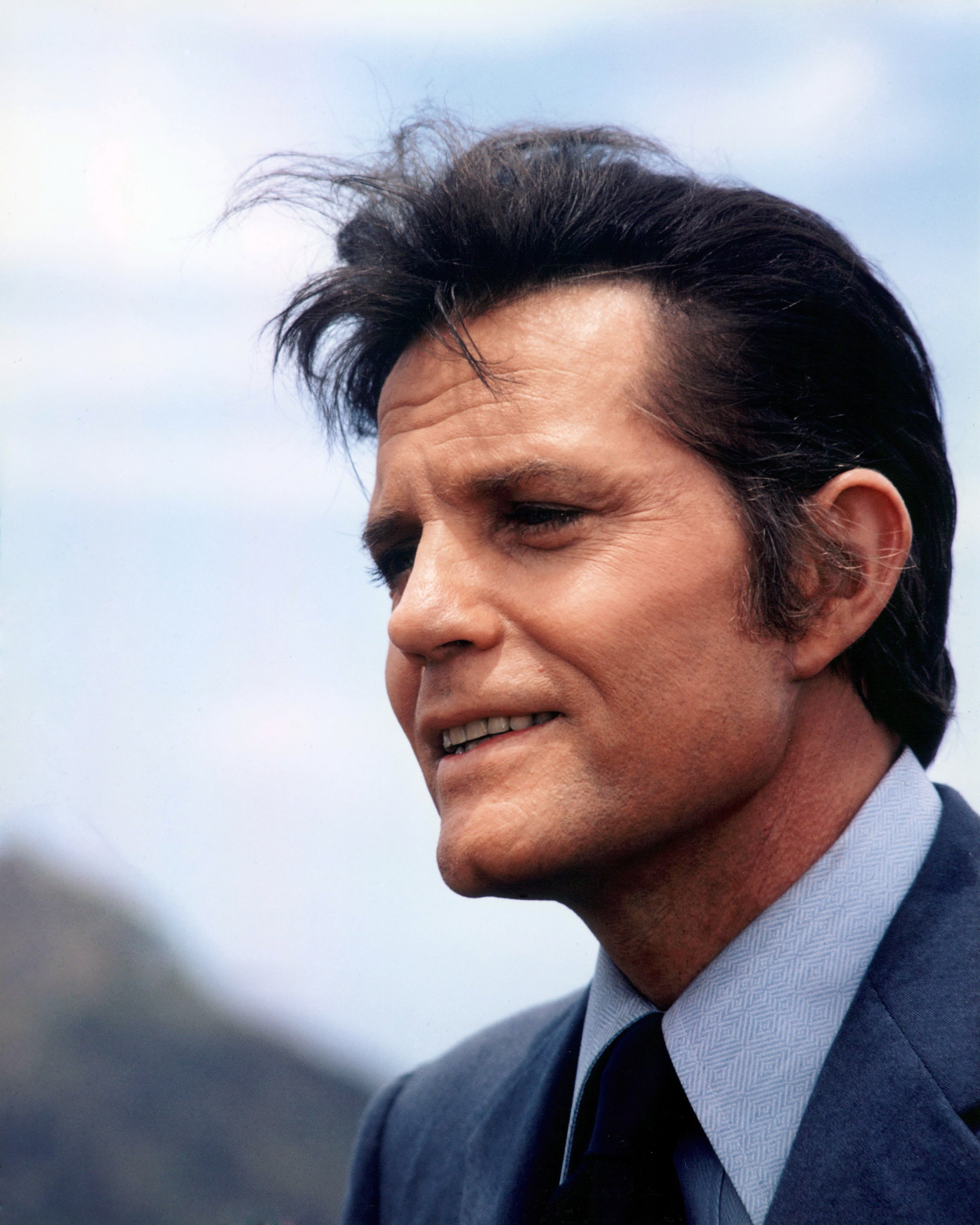 Headshot of US actor Jack Lord in a profile in a publicity portrait issued for the US television series. 'Hawaii Five-0', USA, circa 1975. | Source: Getty Images