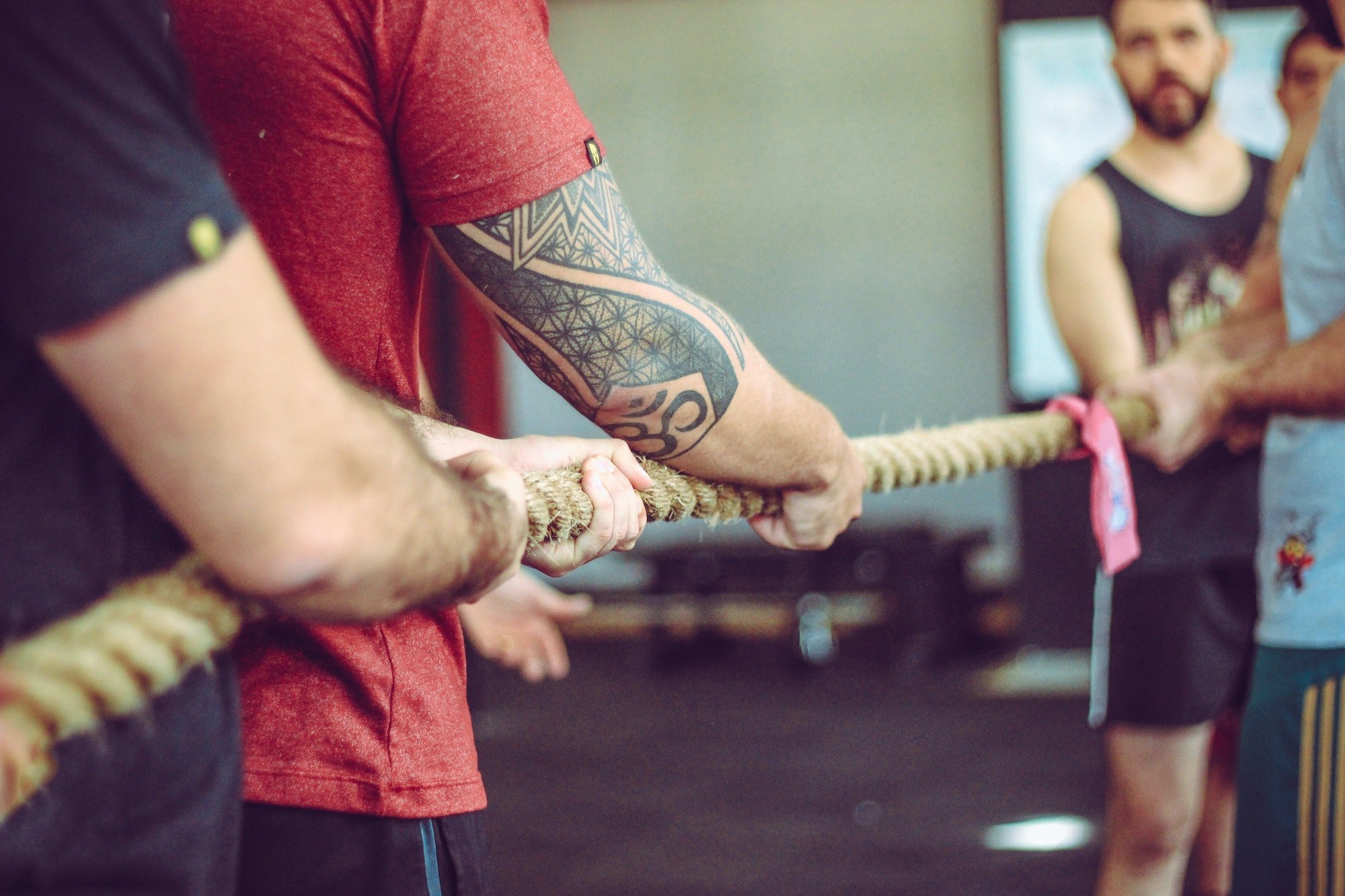 Jim and Alex challenged Peter and John's dads to a round of tug of war. | Source: Pexels