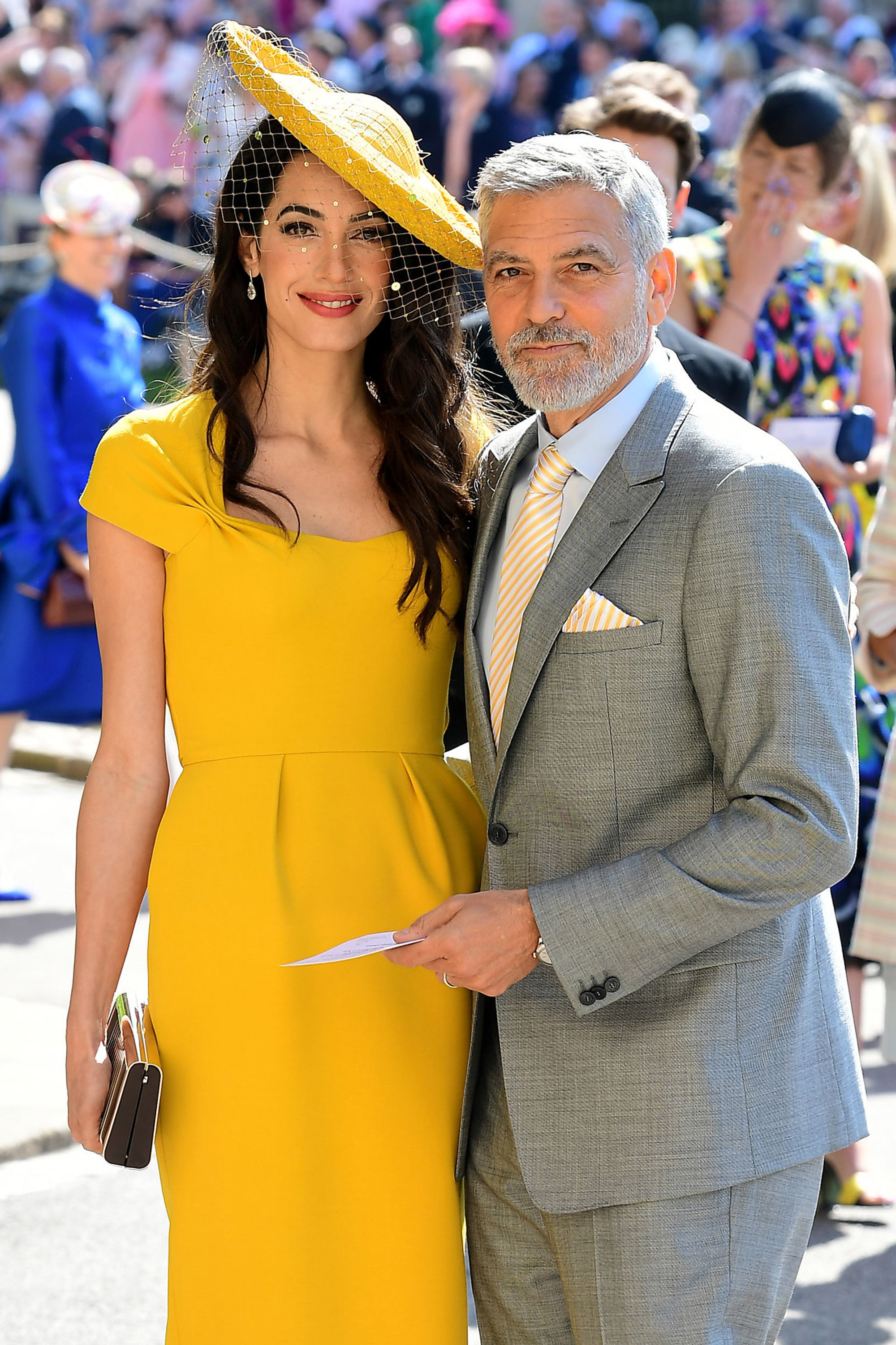 Amal and George Clooney at the wedding of Prince Harry to Meghan Markle on May 19, 2018 in Windsor, England | Source: Getty Images