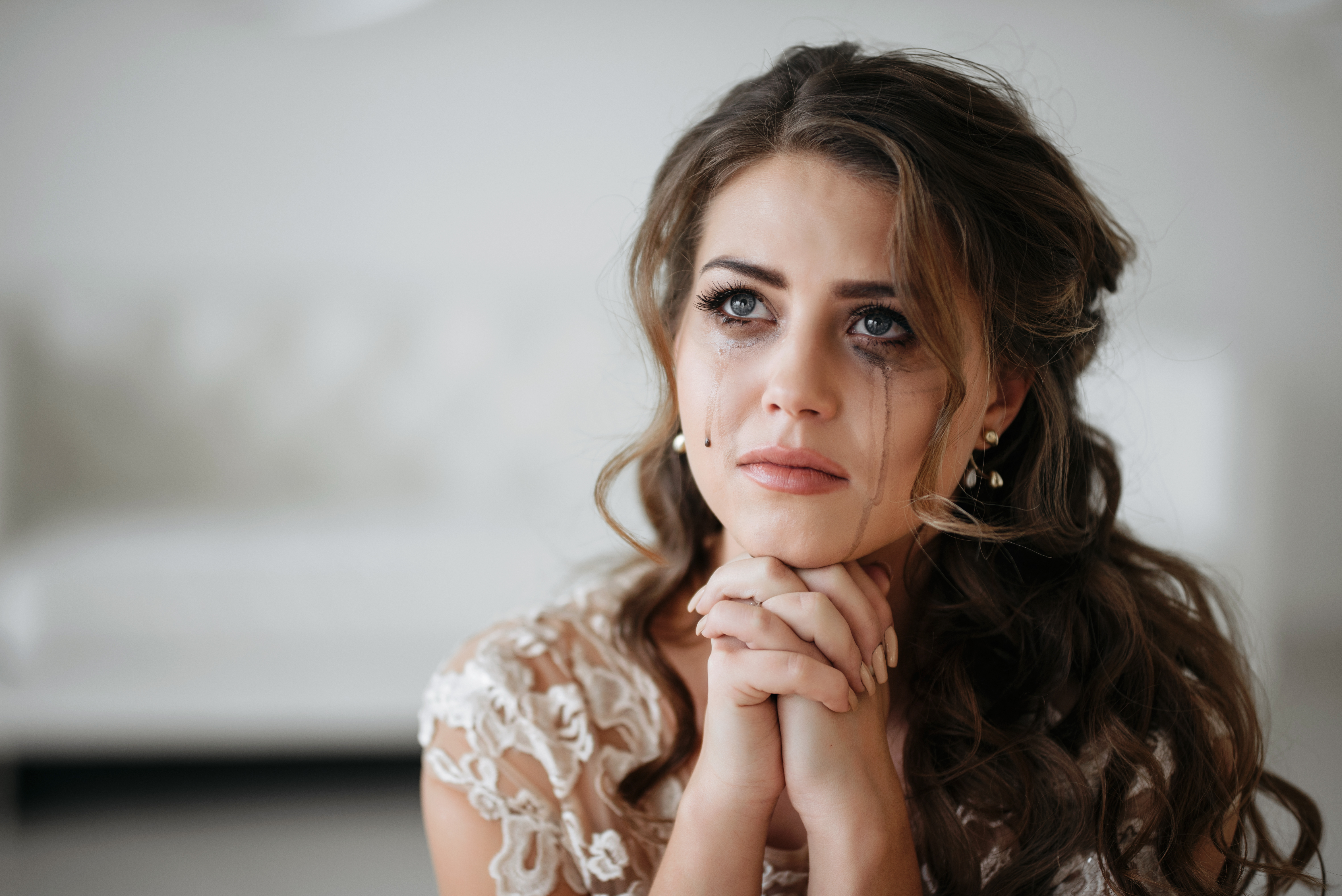 A bride crying on her wedding day | Source: Shutterstock