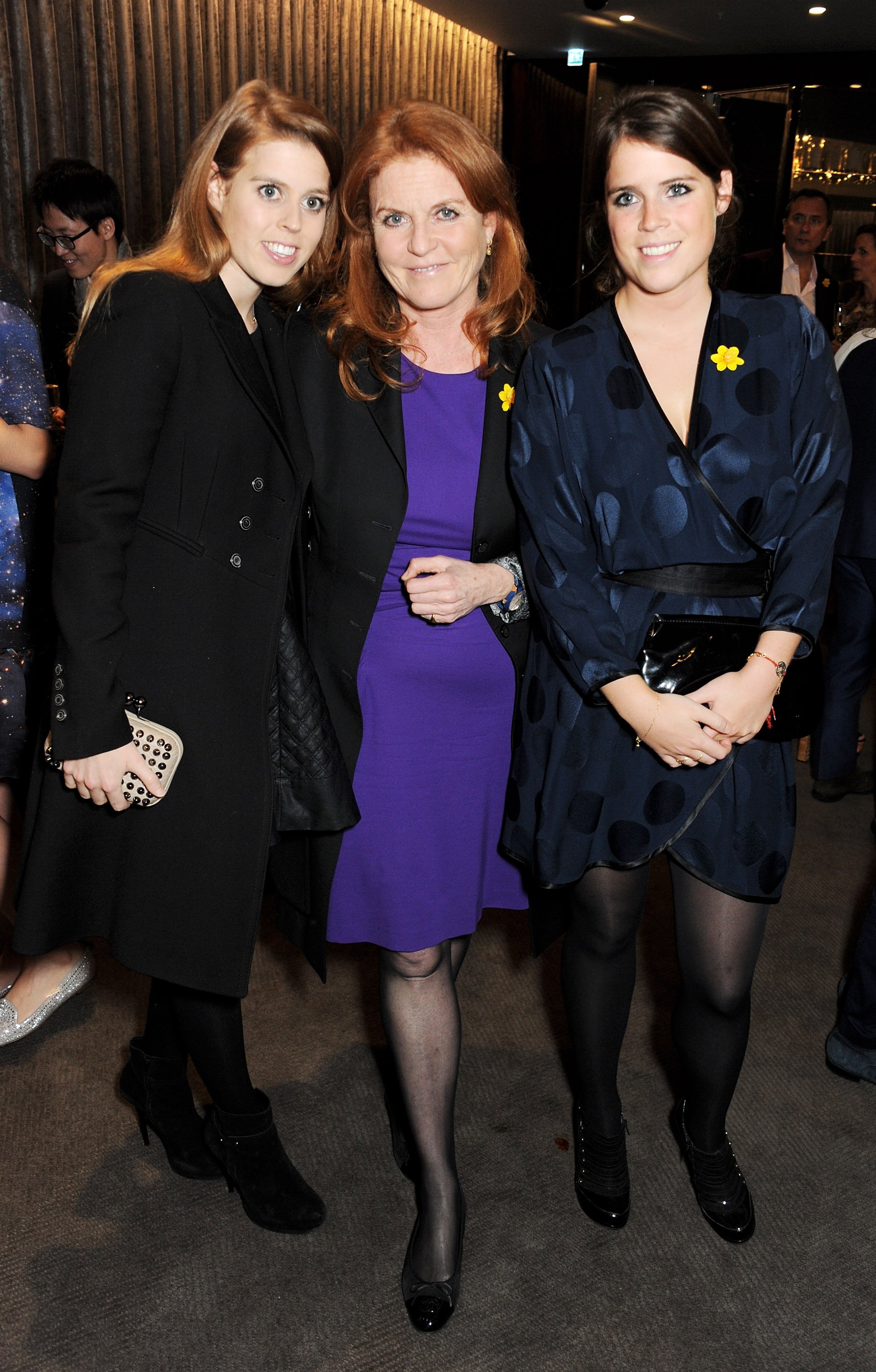 Princess Beatrice, Sarah Ferguson, and Princess Eugenie of York attend a charity auction for the Samsung NX Camera launch in London, England on May 14, 2013 | Photo: Getty Images