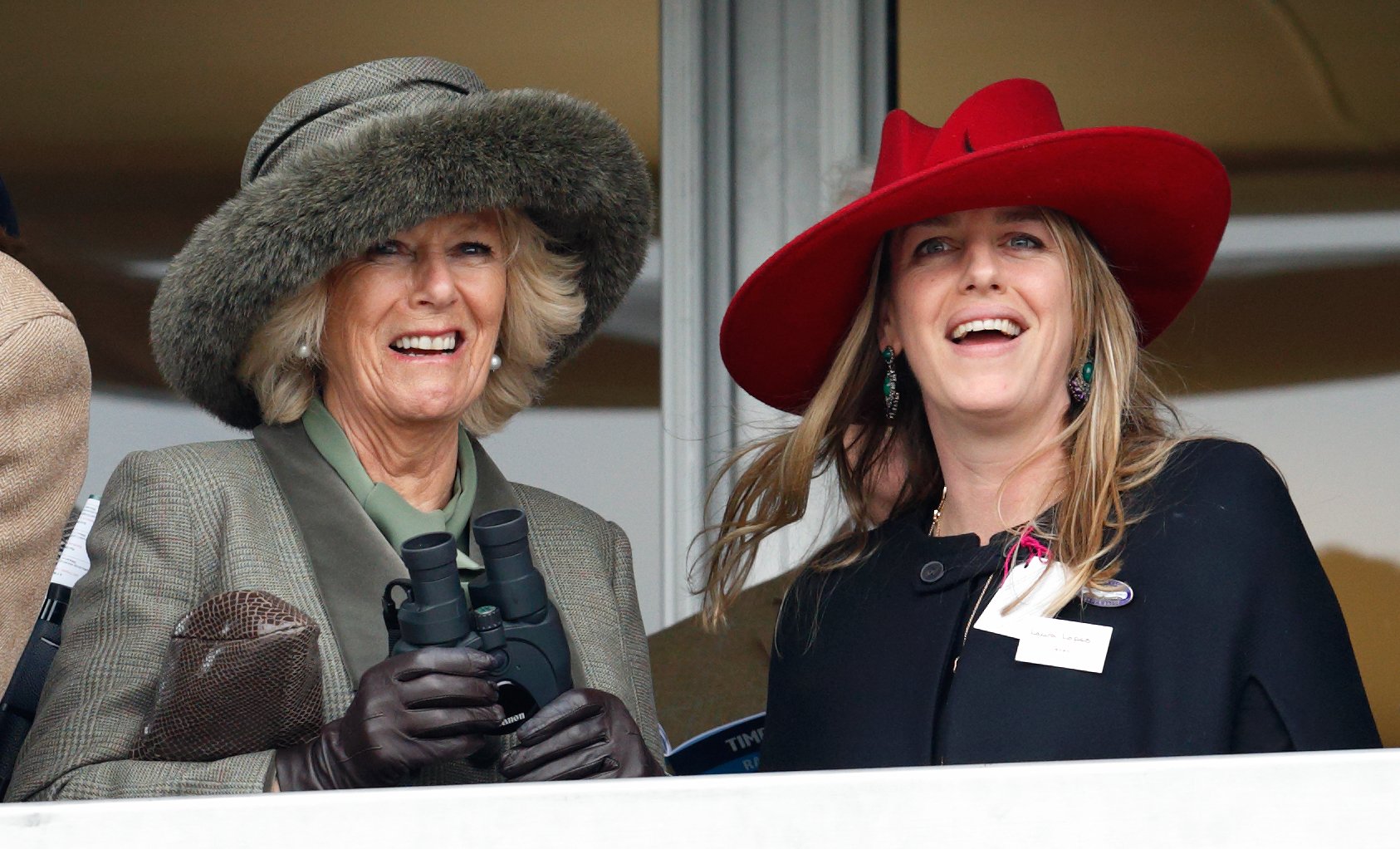 Duchess Camilla and Laura Lopes watch the racing at the Cheltenham Festival at Cheltenham Racecourse on March 11, 2015, in England. | Source: Getty Images