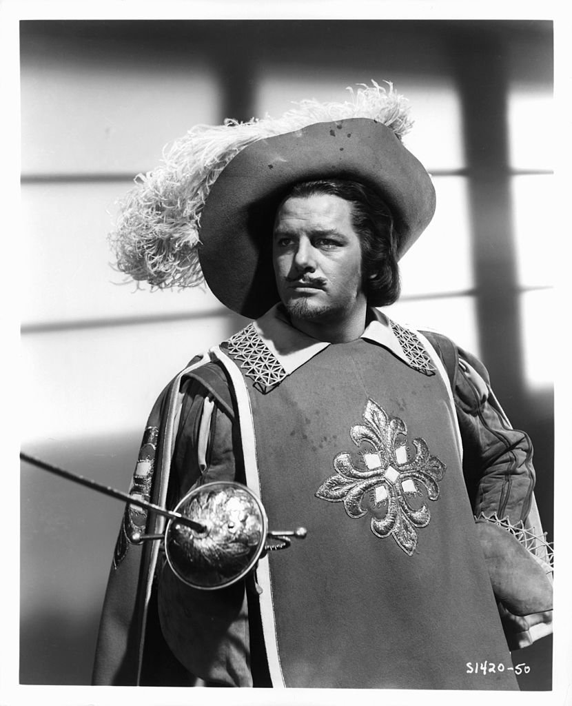 Gig Young holding the sword in publicity portrait for the film 'The Three Musketeers', 1948.  | Photo: Getty Images