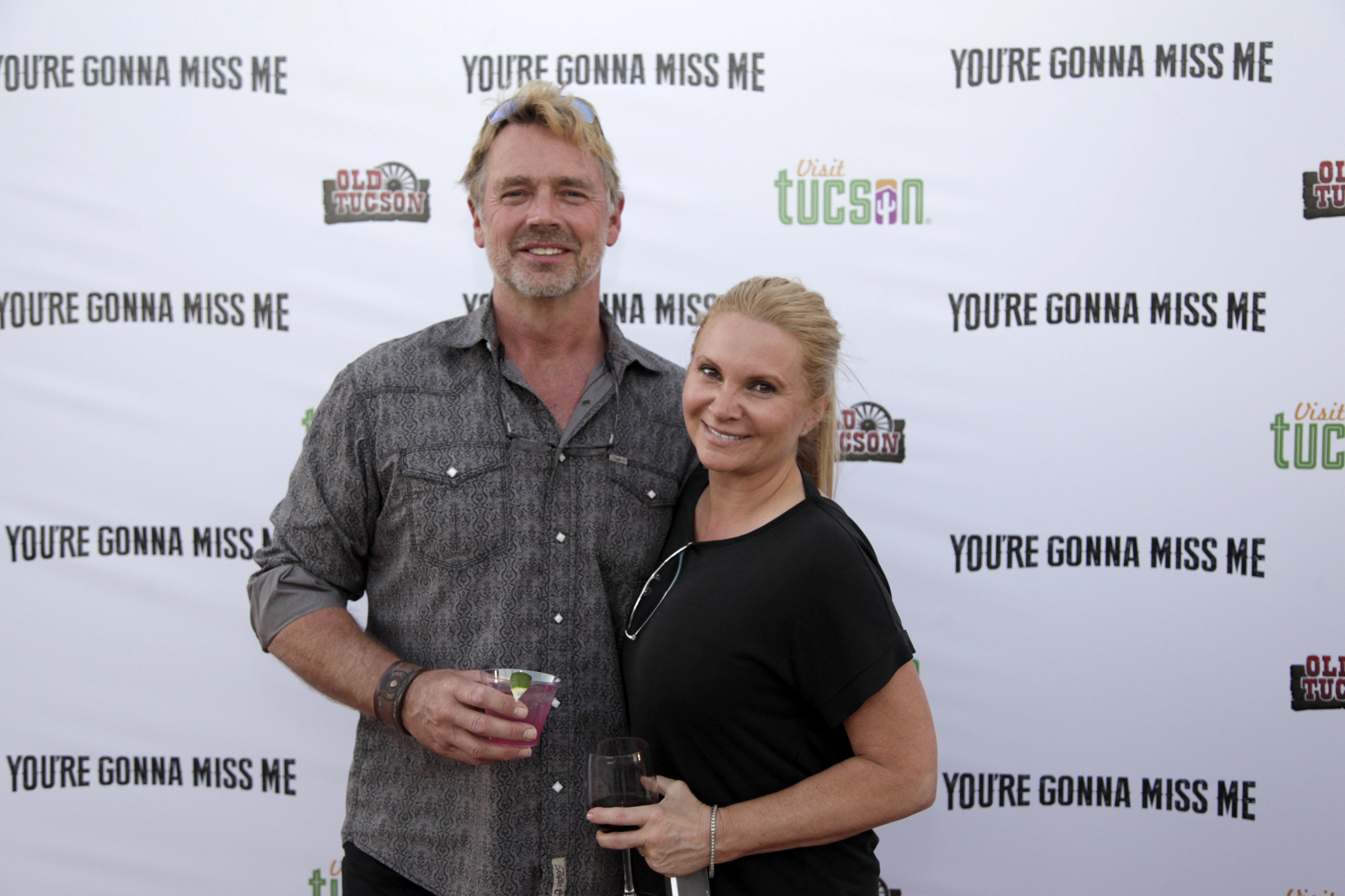 John Schneider and Alicia Allain attend "You're Gonna Miss Me" premiere sponsored by Visit Tucson on May 13, 2017 | Photo: GettyImages