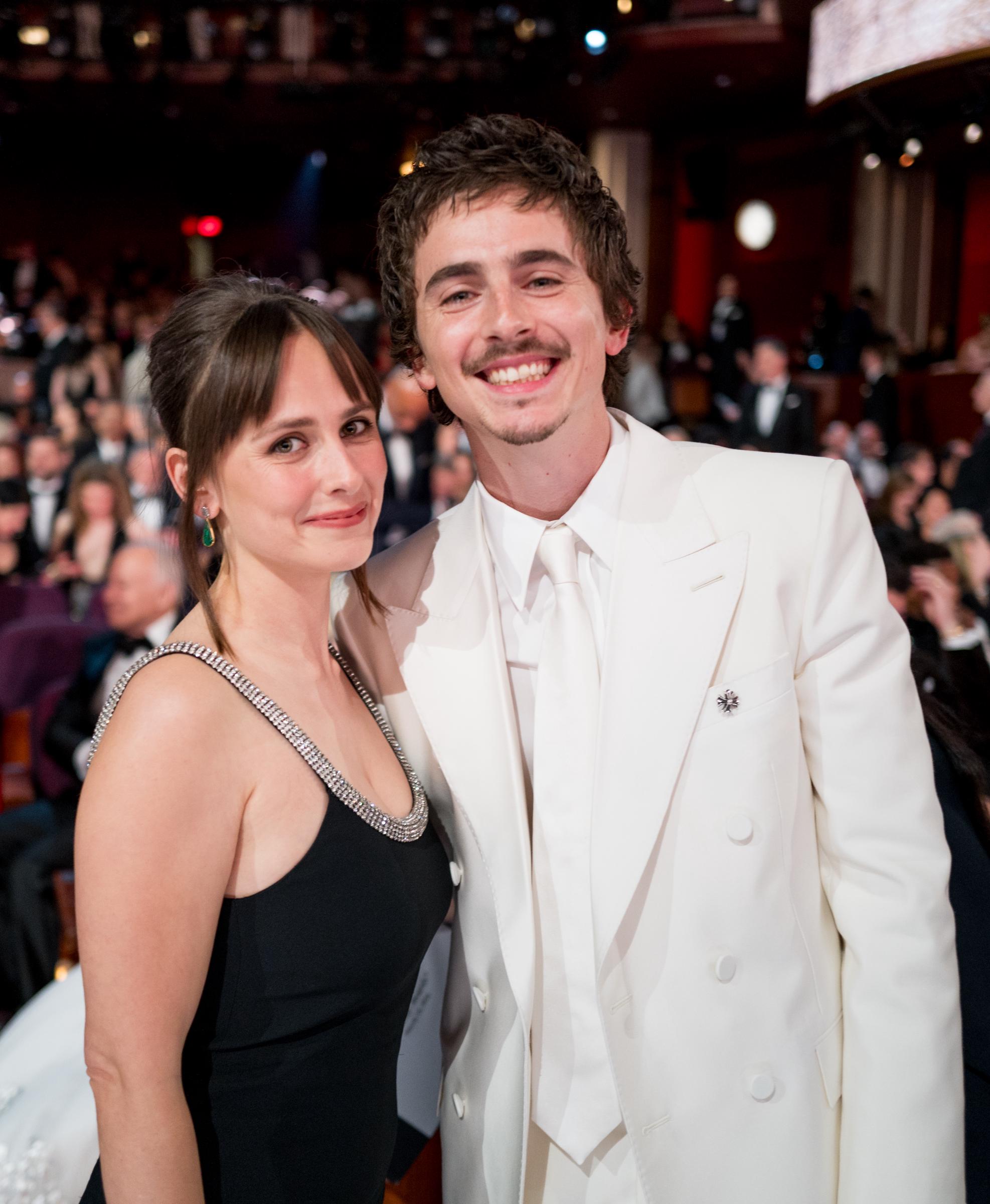 Pauline Chalamet and Timothee Chalamet pose and smile toward the camera at the 98th Academy Awards on March 15, 2026 | Source: Getty Images