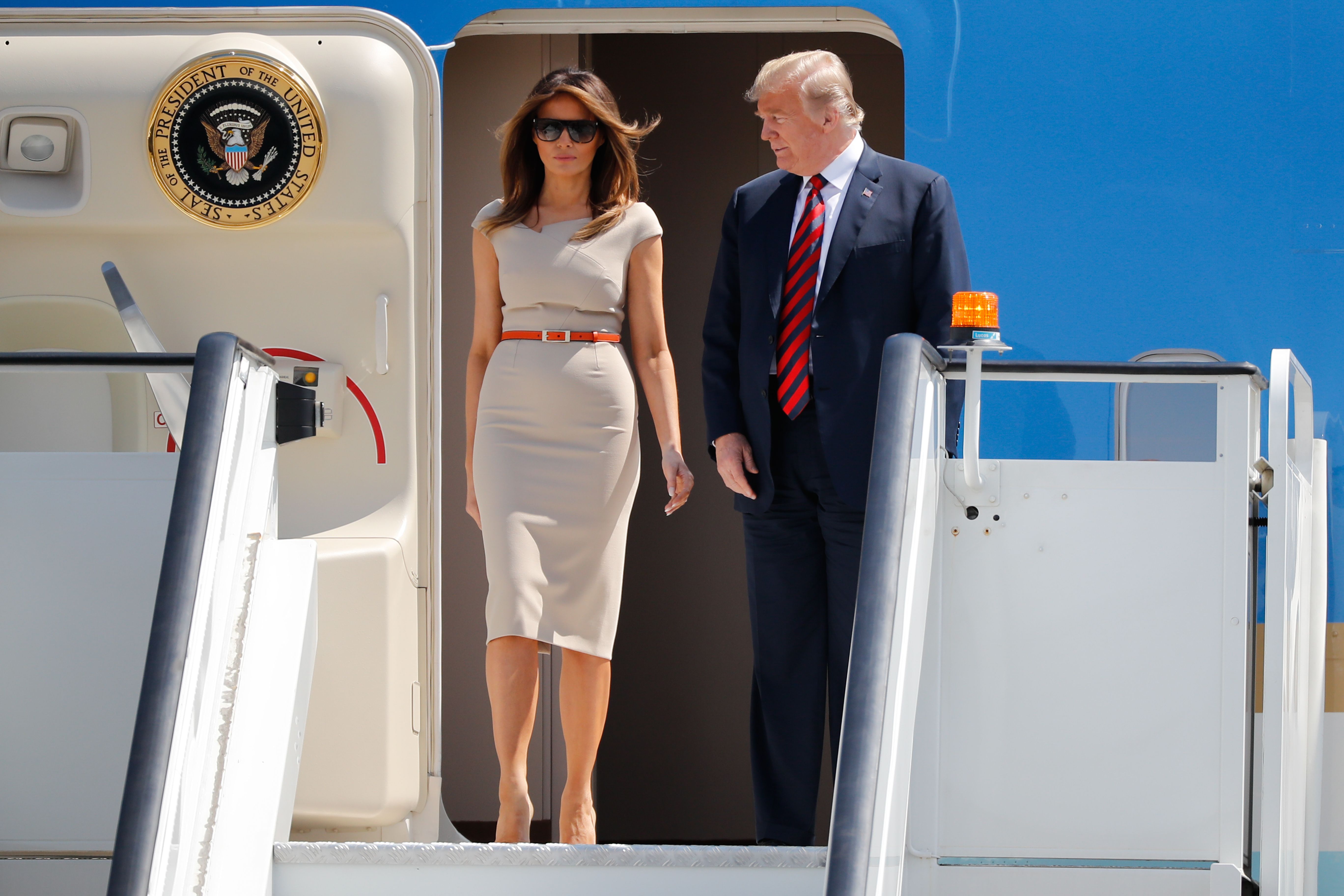 Donald and Melania Trump disembark Air Force One at Stansted Airport, north of London on July 12, 2018 | Source: Getty Images