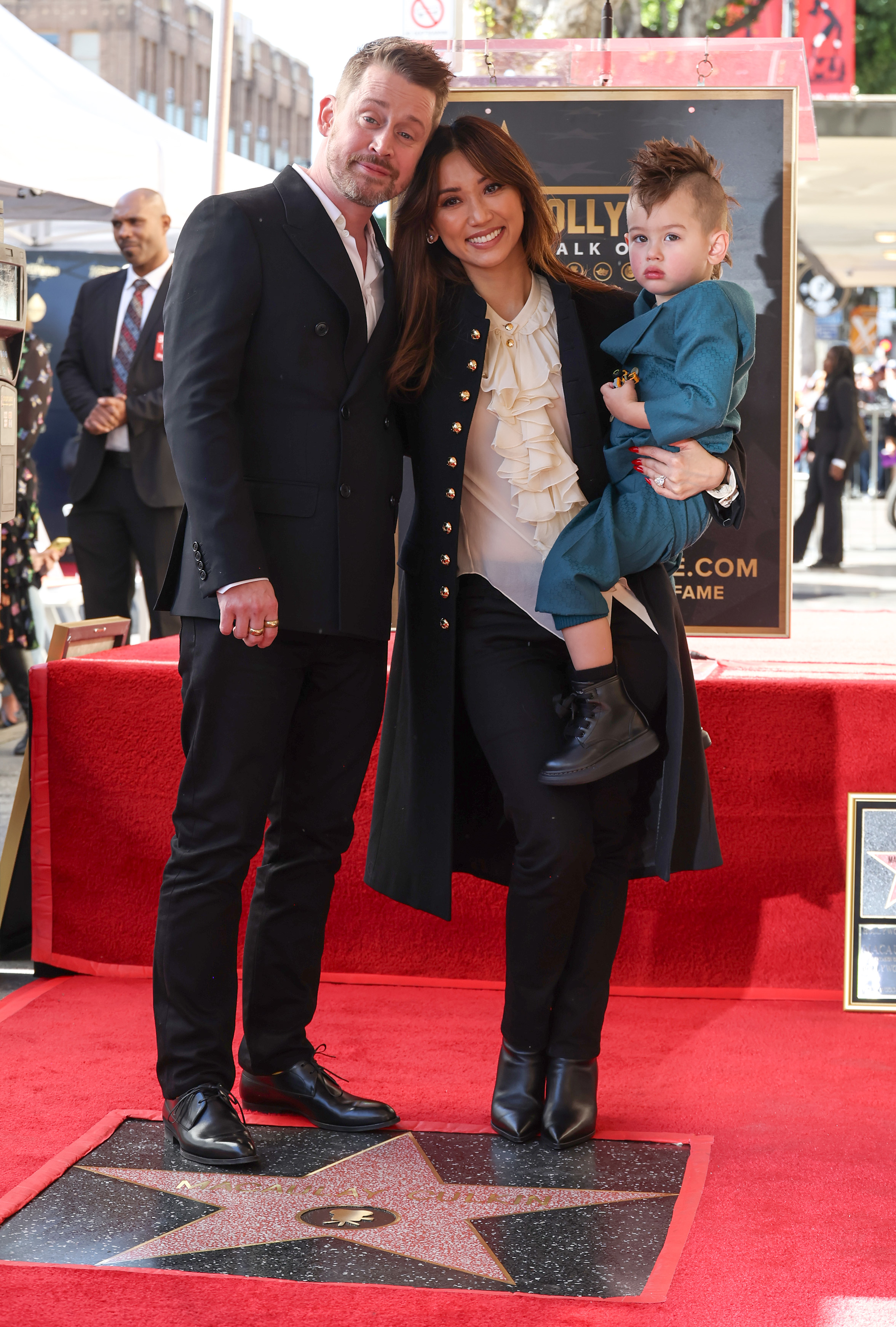 Macaulay Culkin, Brenda Song and their son Dakota at the Hollywood Walk of Fame on December 1, 2023 in Los Angeles, California | Source: Getty Images