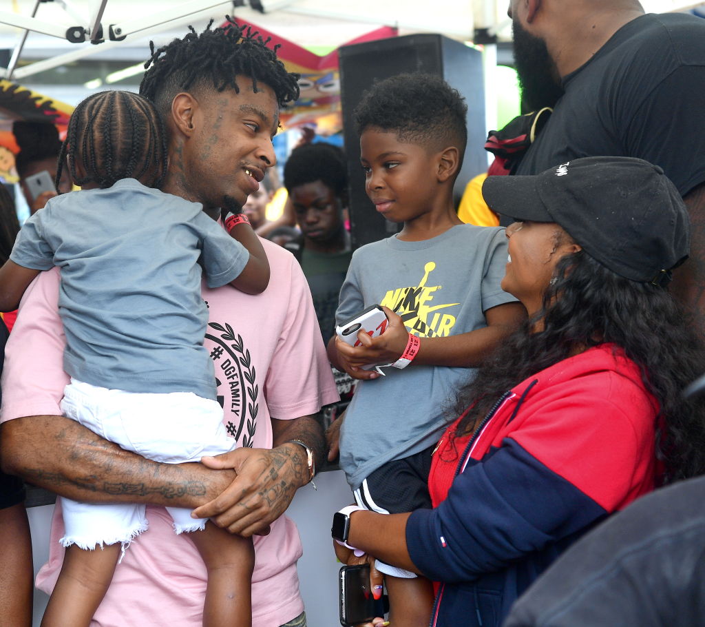 21 Savage and Heather Carmillia Joseph during the 4th Annual Issa Back 2 School Drive on August 4, 2019, in Decatur, Georgia. | Source: Getty Images
